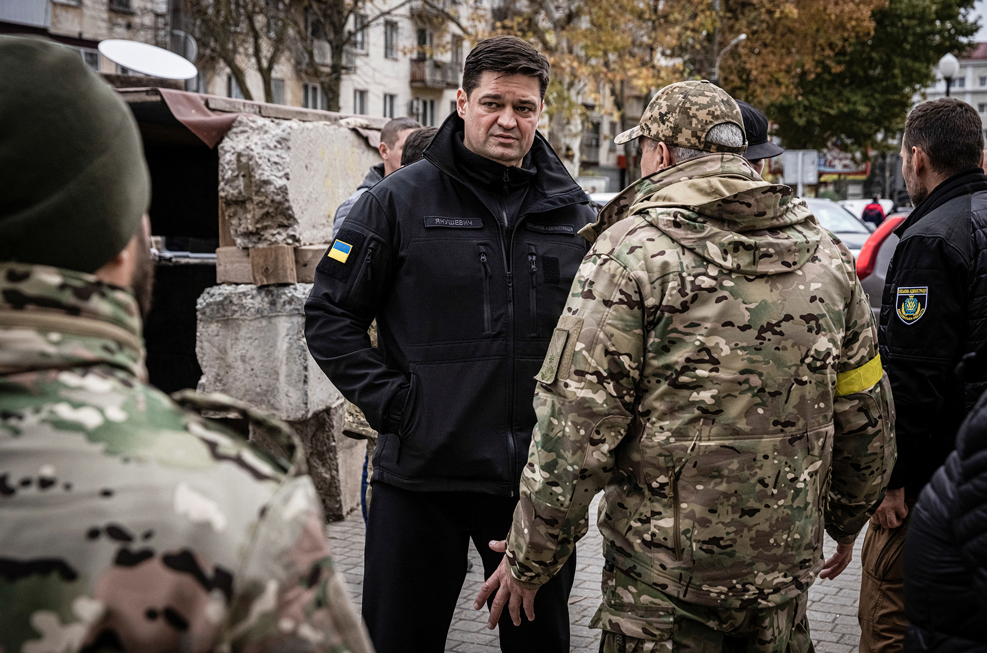 The governor of Kherson region, Yaroslav Yanushevych, speaks to a soldier in Kherson's Freedom Square, in Kherson, Ukraine, on November 16.