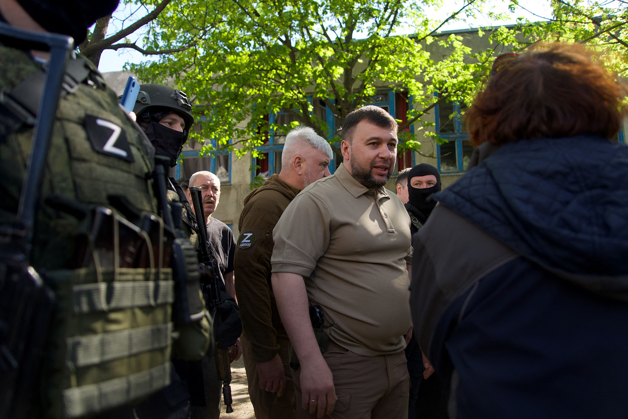 Denis Pushilin, center, leader of the separatists in the self-proclaimed Donetsk People's Republic (DNR), meets with local residents in the city of Mariupol, Ukraine, on April 29.