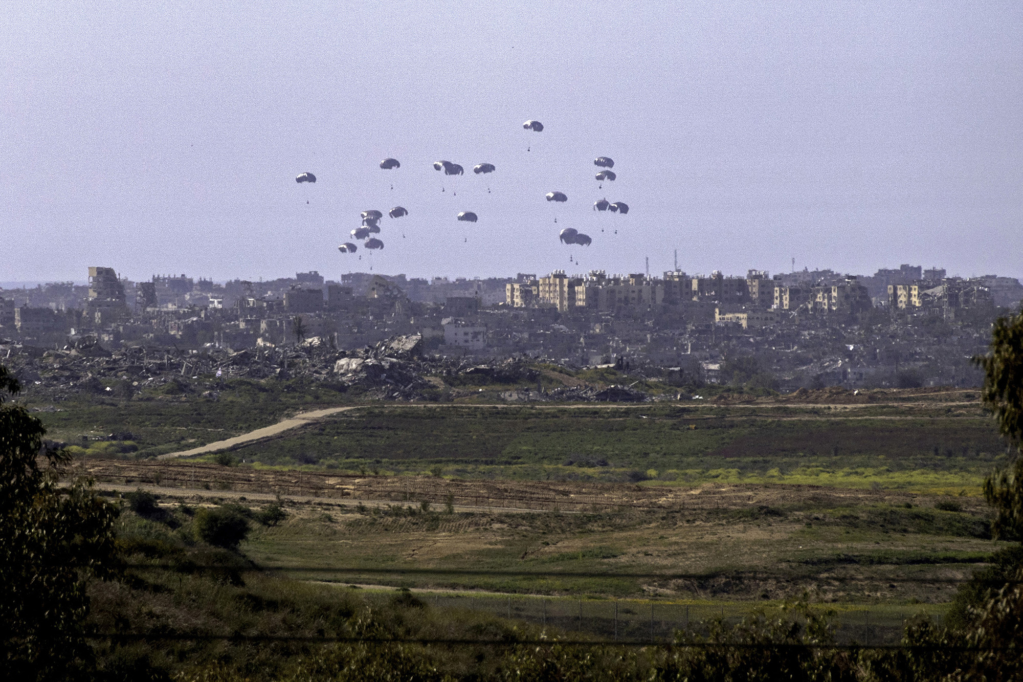 Aid parcels being airdropped over northern Gaza on March 5.