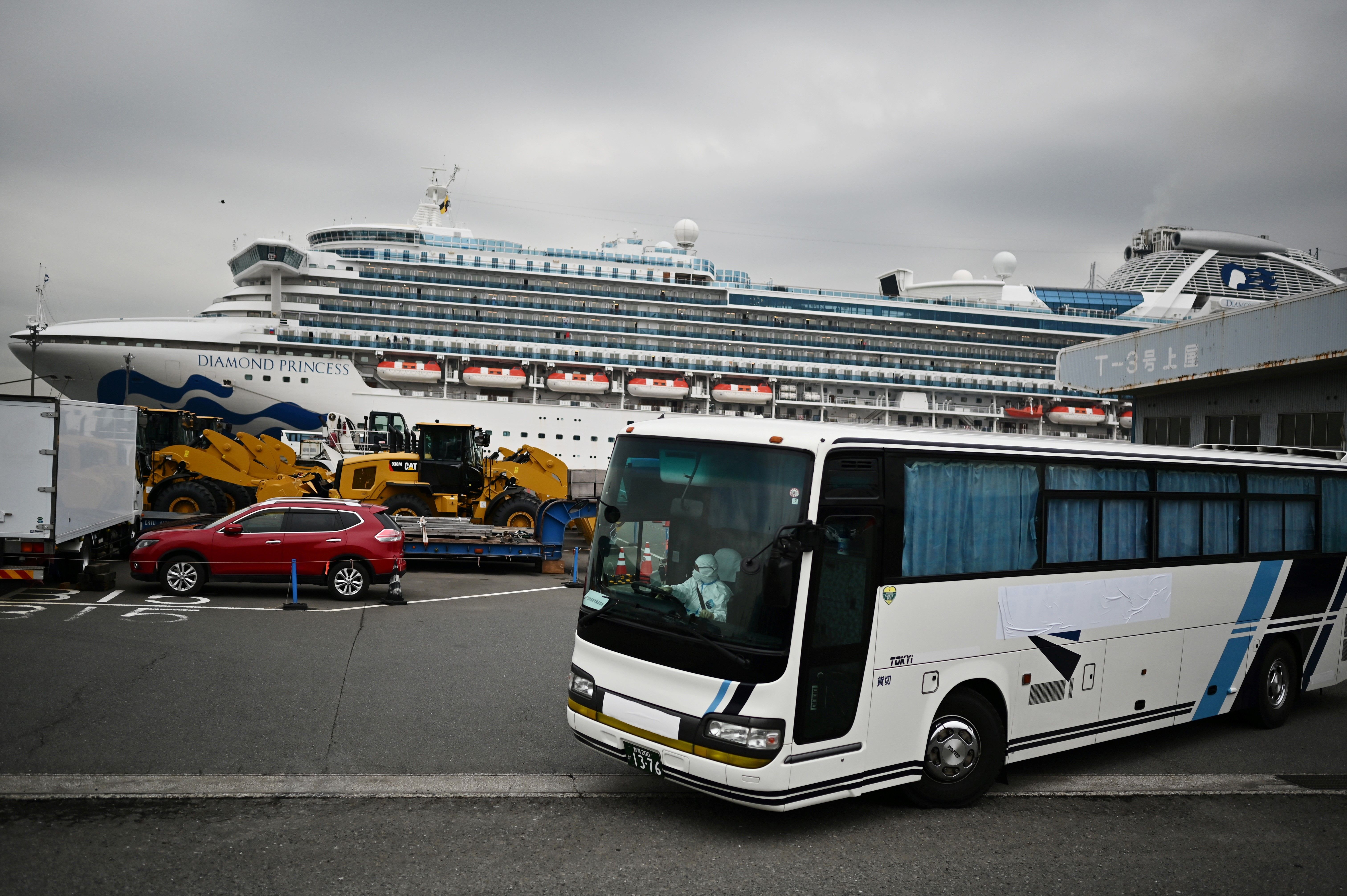 A bus next to the Diamond Princess cruise ship, docked under quarantine in Yokohama, Japan, on February 14, 2020.