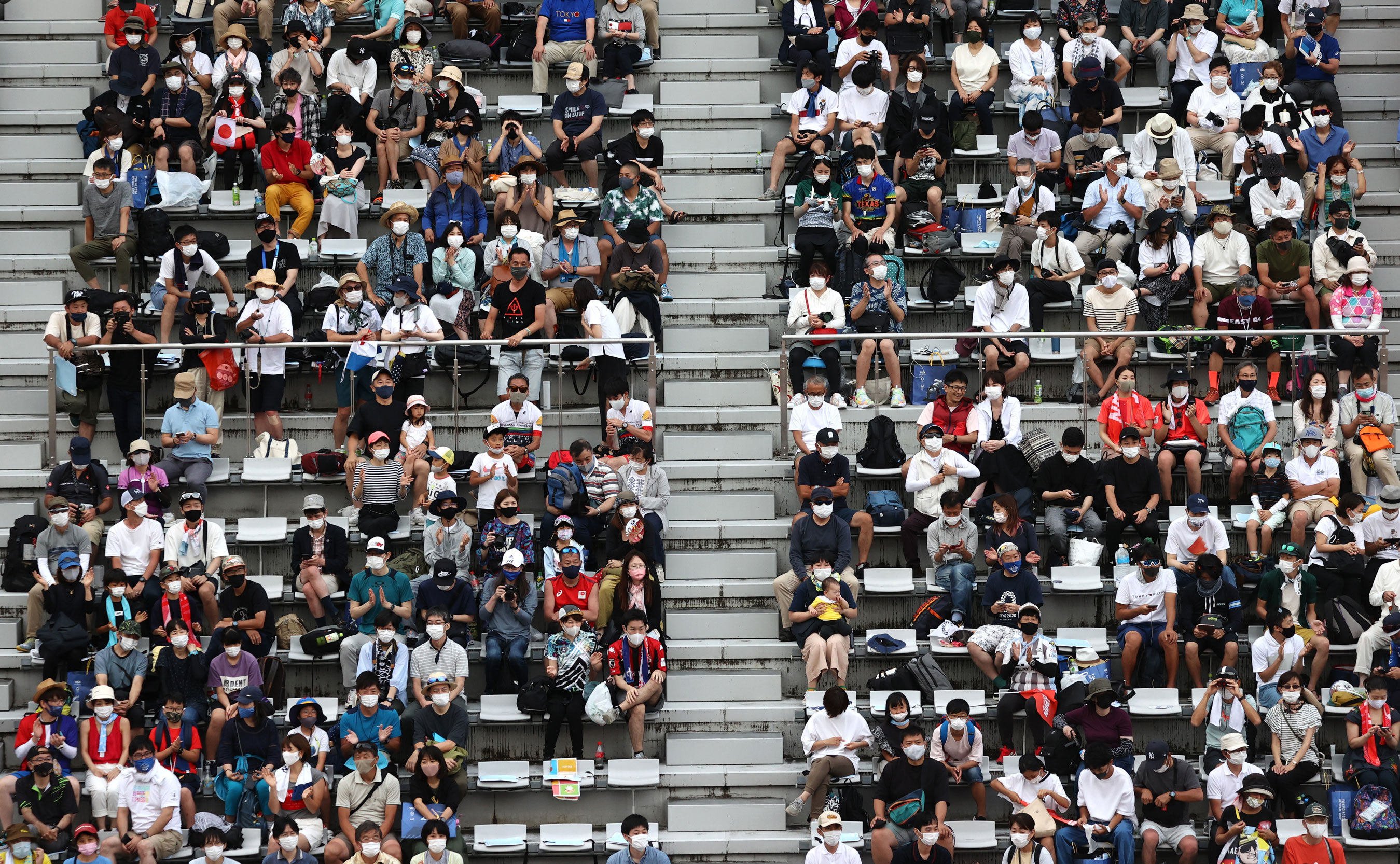 Fans watch the Men's road race at Fuji International Speedway.