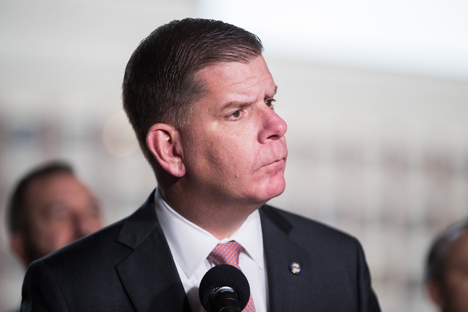 Boston Mayor Marty Walsh listens to a question at a press conference on March 13, in Boston, Massachusetts.