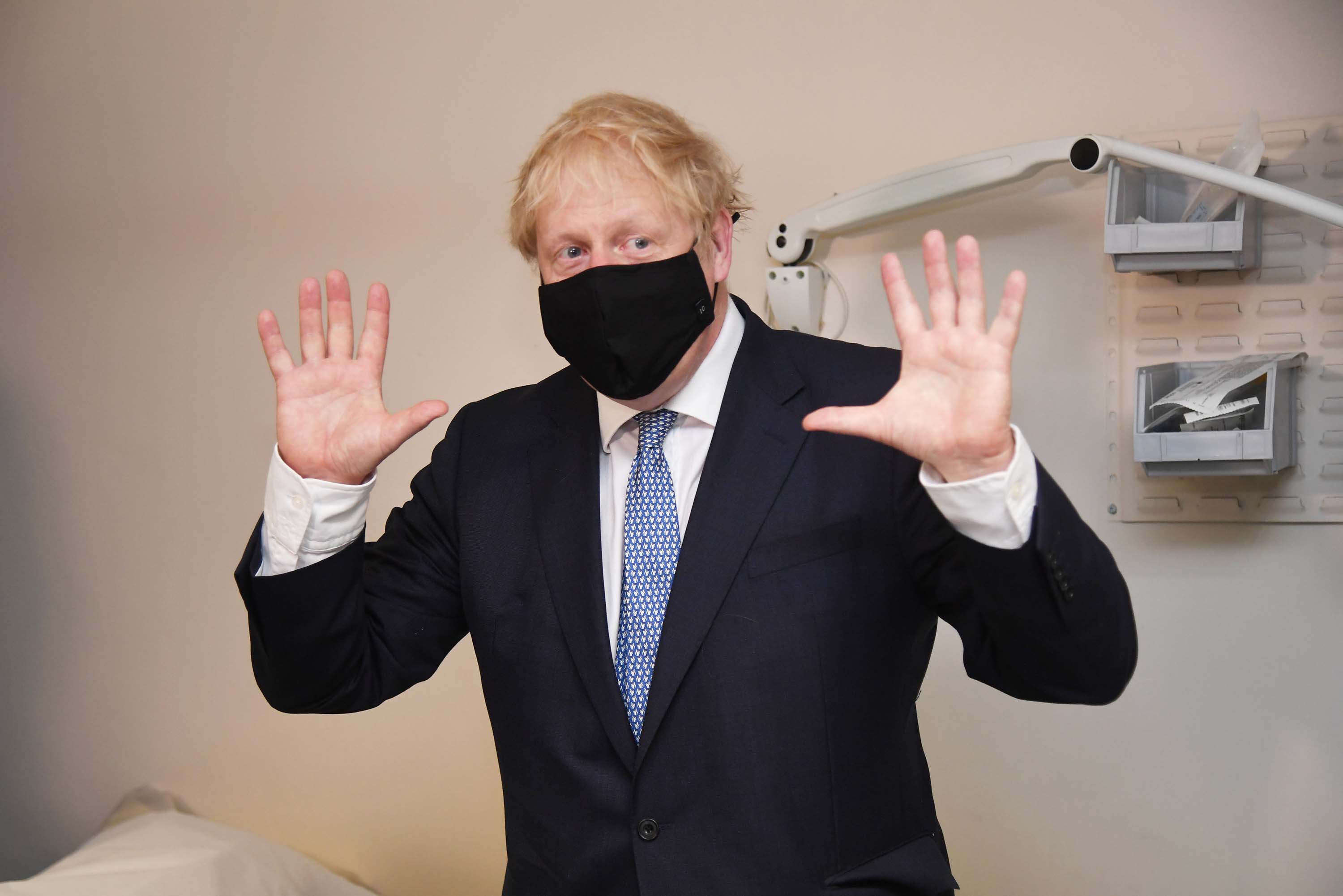 British Prime Minister Boris Johnson visits Tollgate Medical Centre in London, on Friday, July 24.