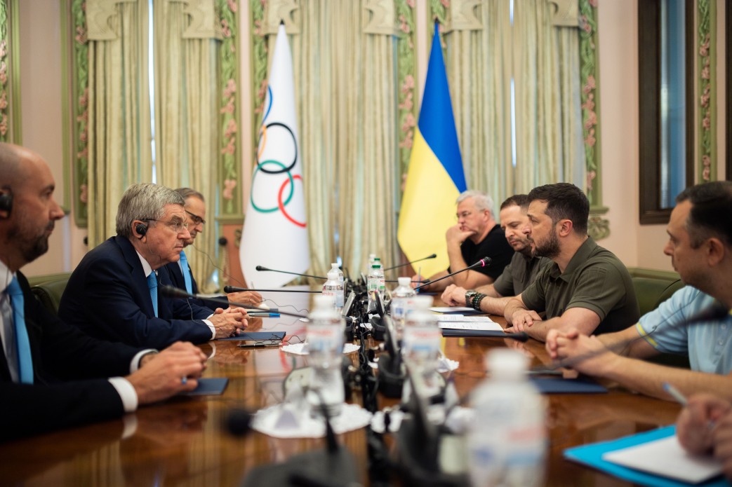 President of the International Olympic Committee Thomas Bach, center left, and President of Ukraine Volodymyr Zelensky, center right, hold a meeting in Kyiv, Ukraine, on July 3.