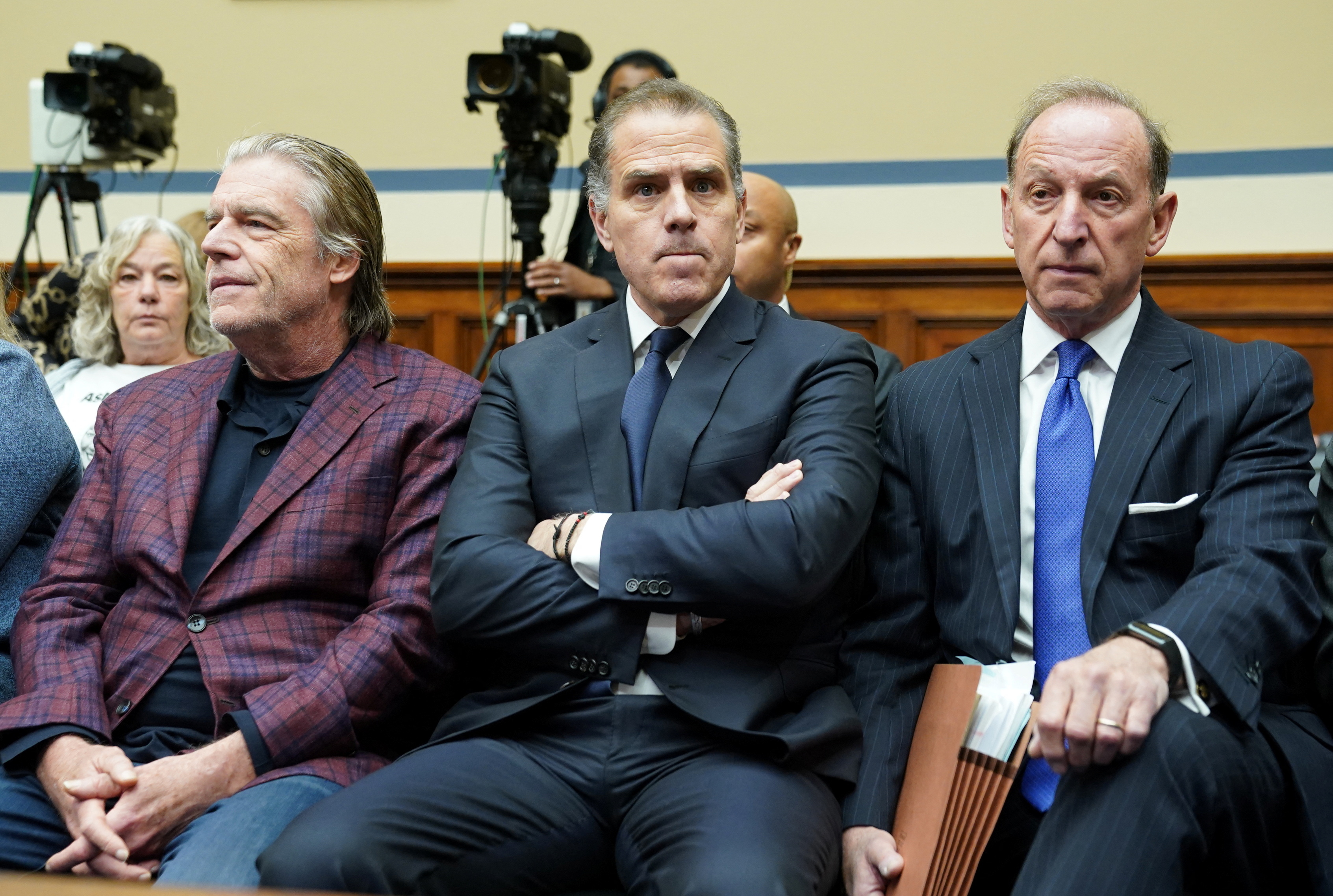 Hunter Biden, center, sits with his lawyers — Kevin Morris, left, and Abbe Lowell, right — during a hearing on Capitol Hill in Washington, DC, on January 10.
