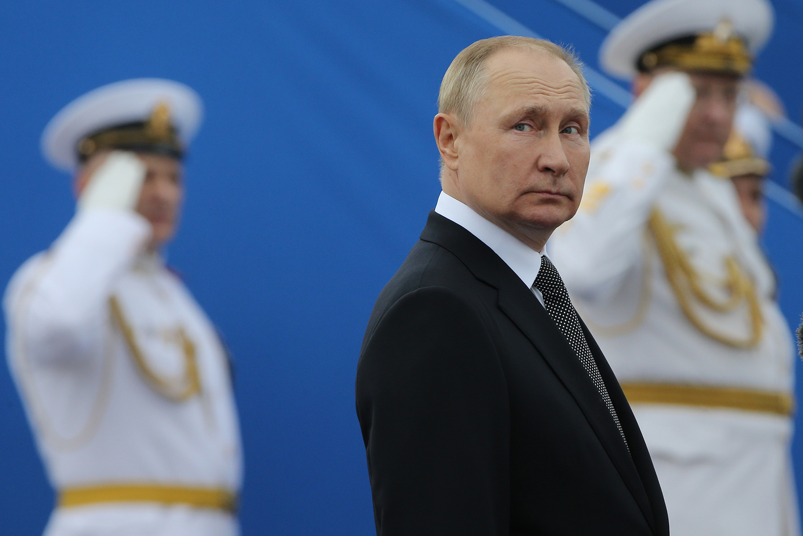 Russian President Vladimir Putin looks on during the Navy Day Parade in Saint Petersburg on July, 31.