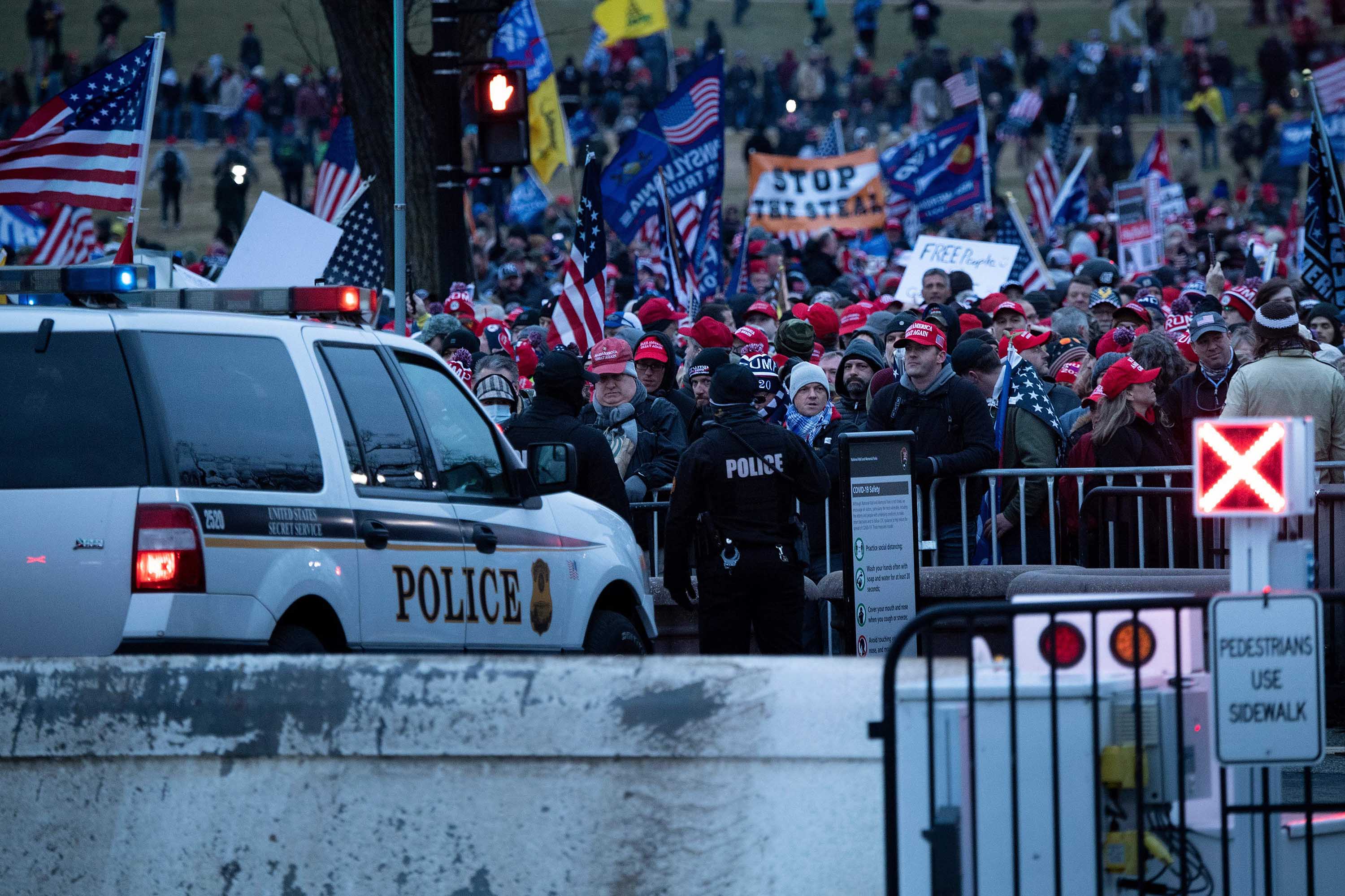 People wait to enter a rally for supporters of President Trump on the Ellipse outside of the White House in Washington, D.C., on January 6. 