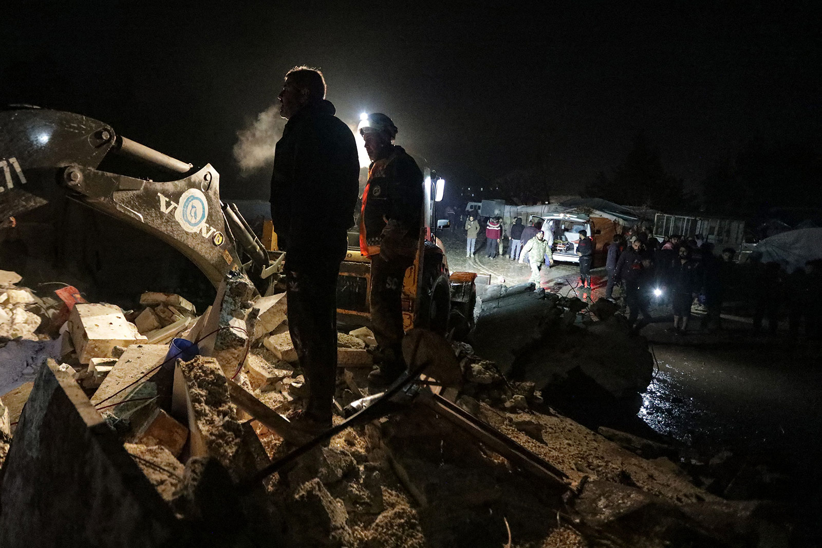 Rescue workers search the rubble of a collapsed building in Azaz, Syria, on February 6. 