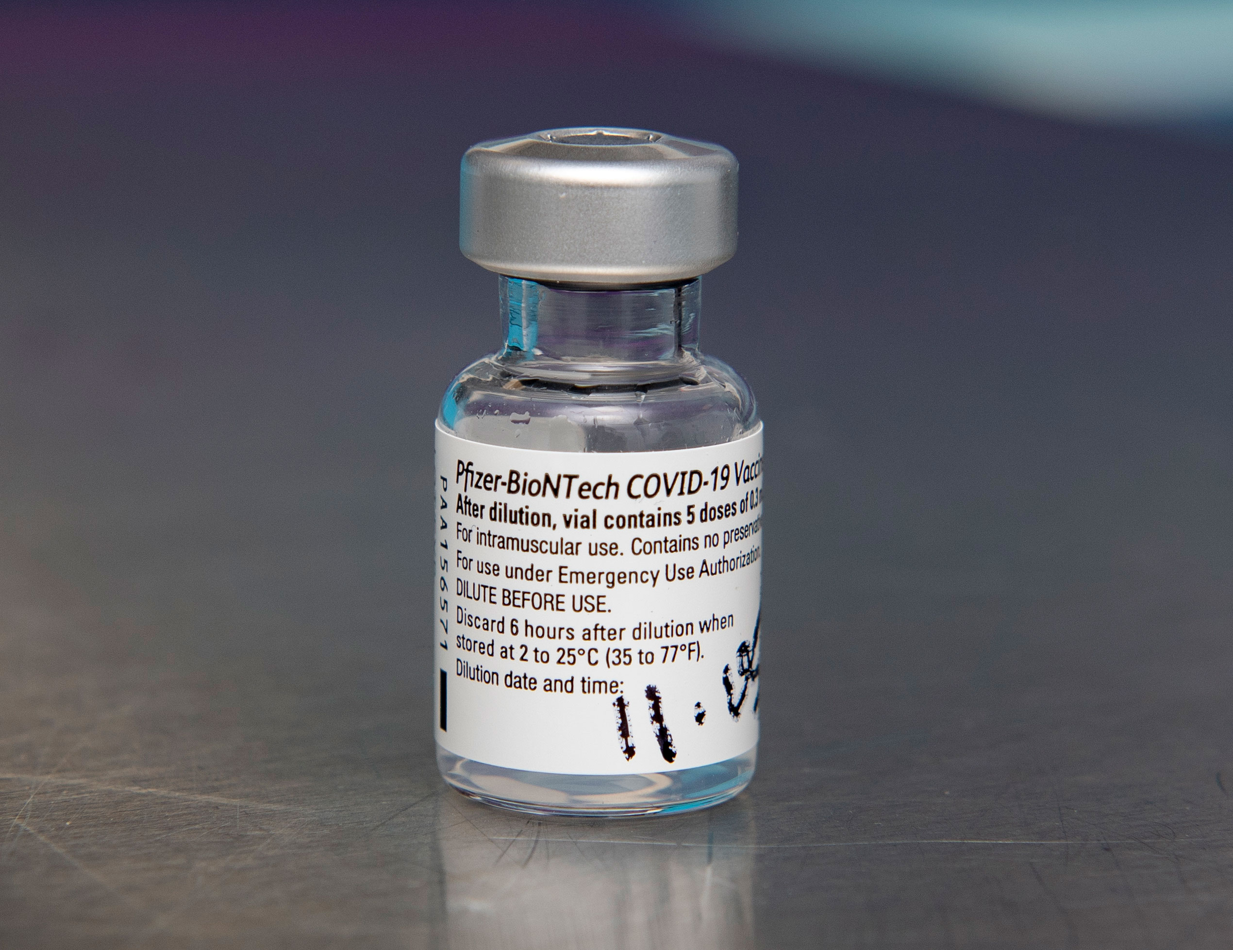 A phial of the Pfizer/BioNTech Covid-19 vaccine is seen at Northern General Hospital in Sheffield, England, on December 8.