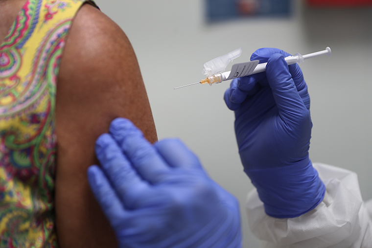 A volunteer takes part in a vaccine study at Research Centers of America on August 07, 2020 in Hollywood, Florida. 