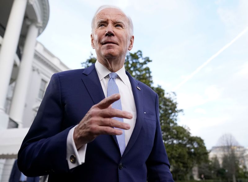 US President Joe Biden speaks to reporters before he boards Marine One on February 24 in Washington DC.