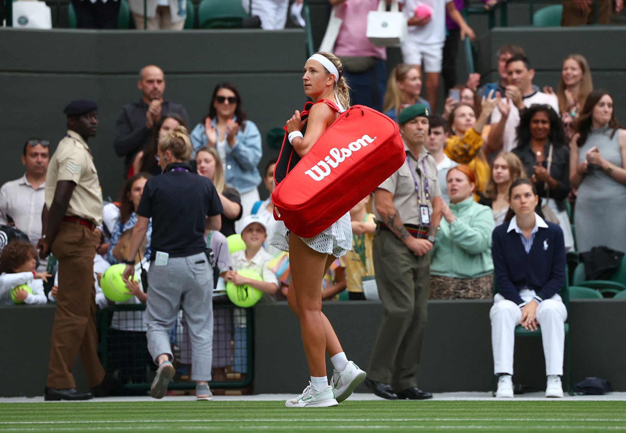 Belarus' Victoria Azarenka reacts to spectators as she leaves the court after losing her fourth round match against Ukraine's Elina Svitolina at Wimbledon, on July 9.
