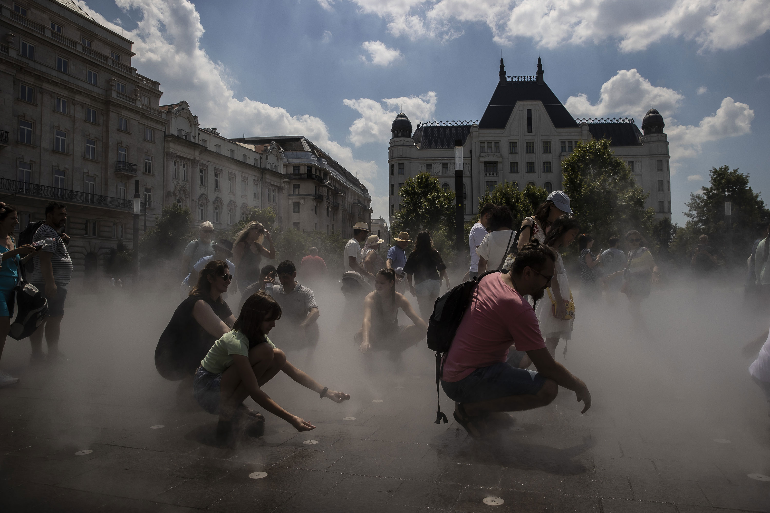 People cool off in Budapest, Hungary, on Sunday.