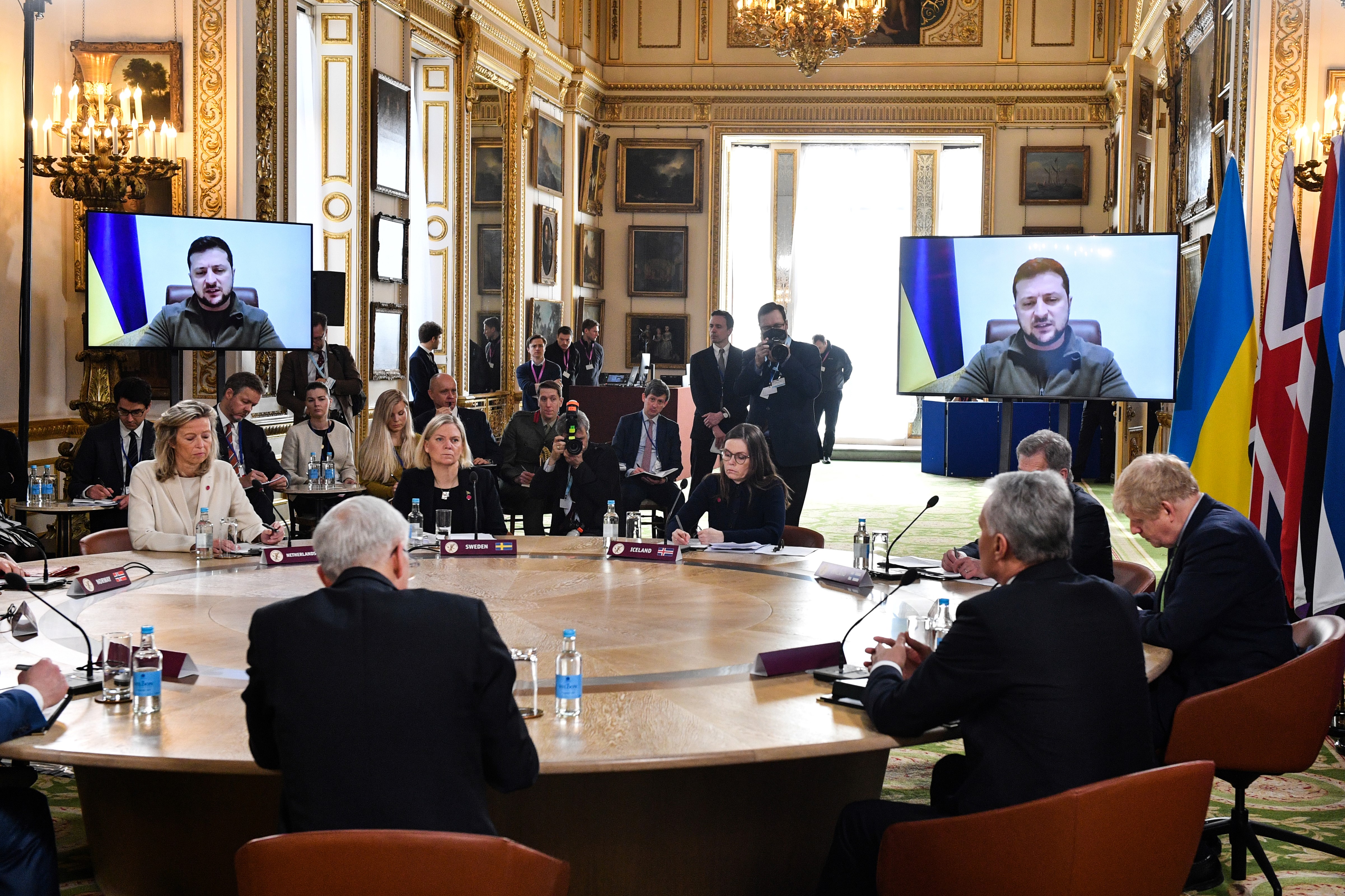 Ukraine's President Volodymyr Zelensky addresses by video link a meeting of the leaders of the Joint Expeditionary Force (JEF) at Lancaster House on March 15 in London, England.