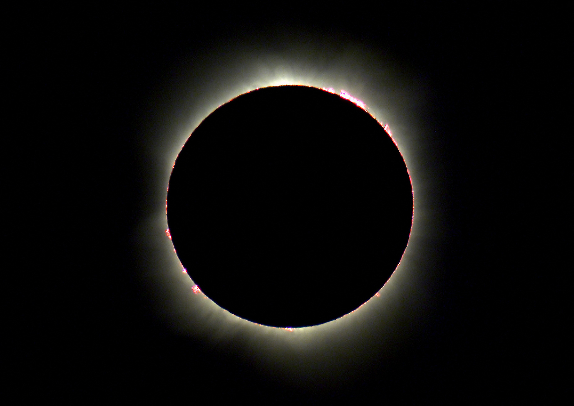 Baily's Beads flare from the corona during a total solar eclipse in Woomera, Australia, in December 2002.