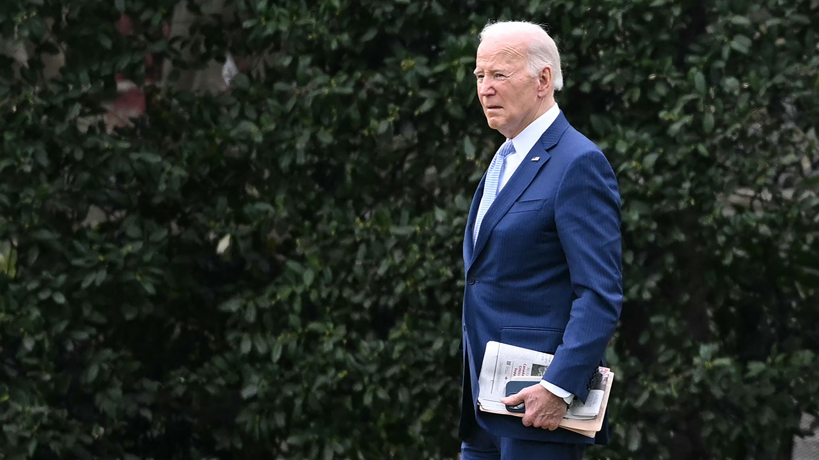 US President Joe Biden makes his way to board Marine One before departing from the South Lawn of the White House in Washington, DC, on Friday, March 22.