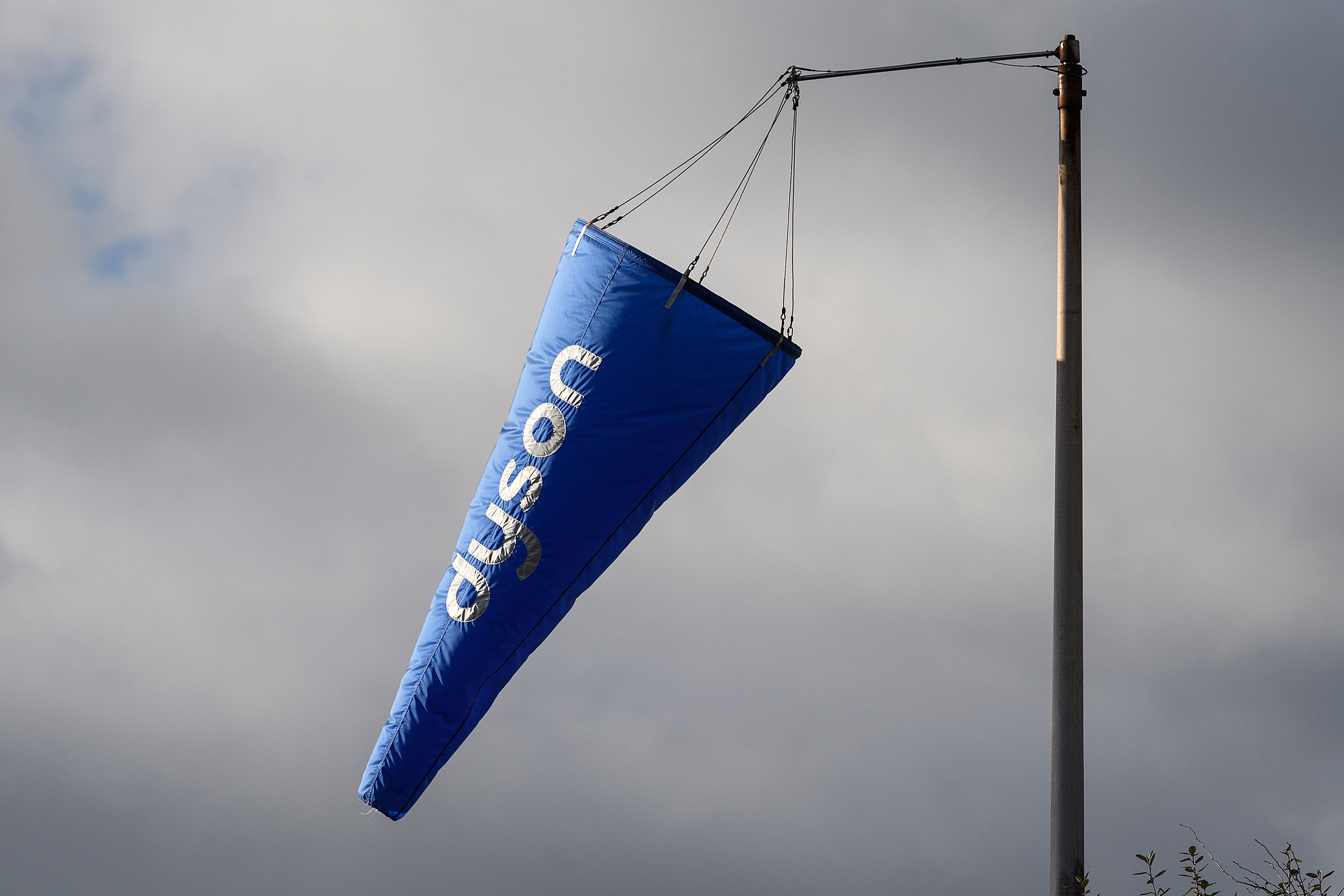 A windsock flies outside of the Dyson headquarters in Malmesbury, England.