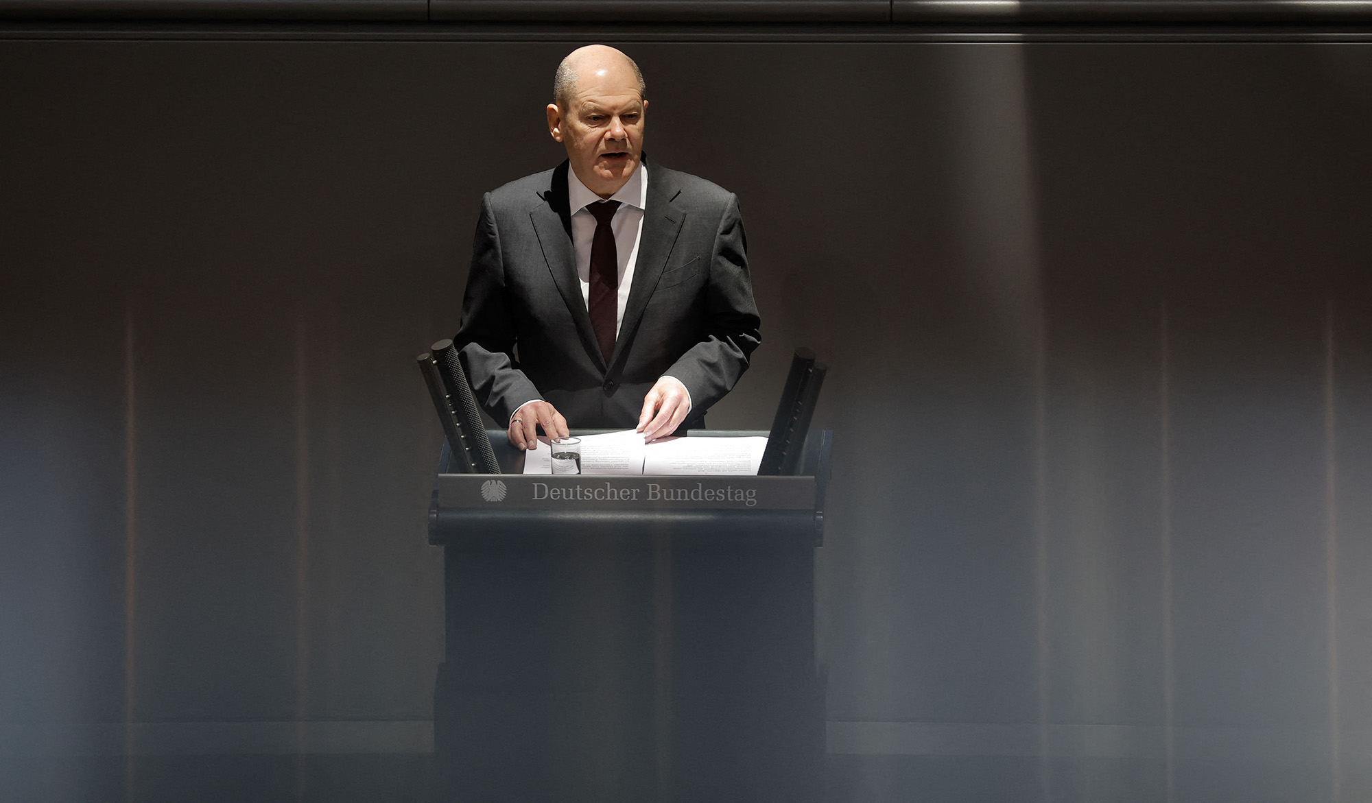 German Chancellor Olaf Scholz addresses delegates on March 16, at the Bundestag (lower house of parliament) in Berlin, Germay.