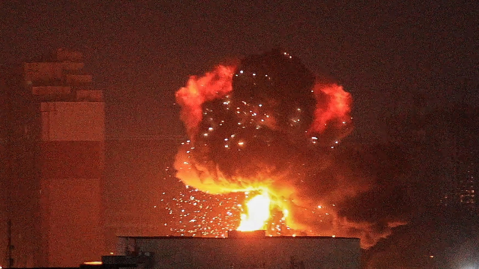 An explosion is seen in the sky over Kyiv, Ukraine, during a Russian missile strike on Wednesday, August 30, 2023. 