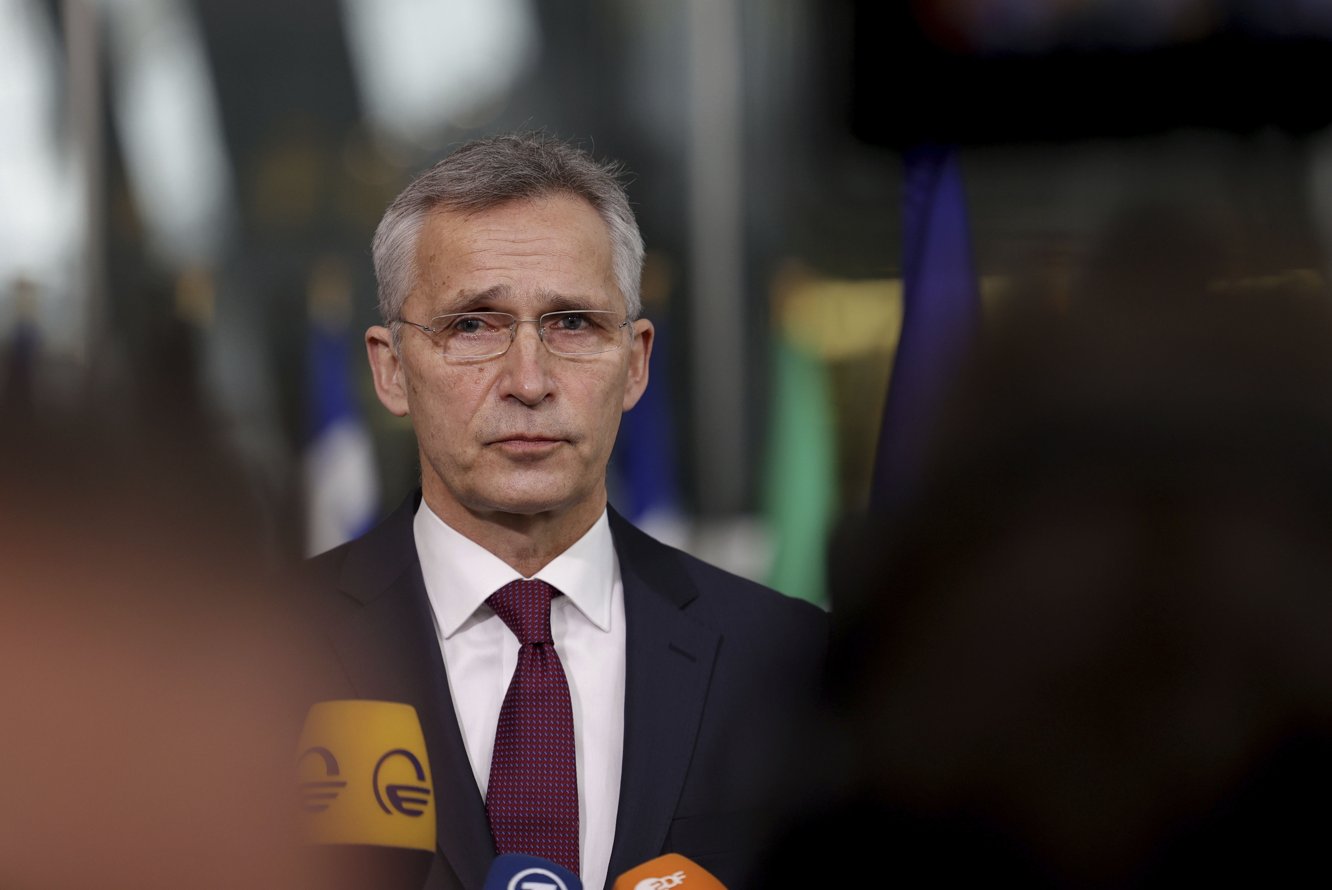 NATO Secretary General Jens Stoltenberg listens to a question from a journalist as he arrives for a meeting of NATO defense ministers at NATO headquarters in Brussels, Belgium, on February 16.
