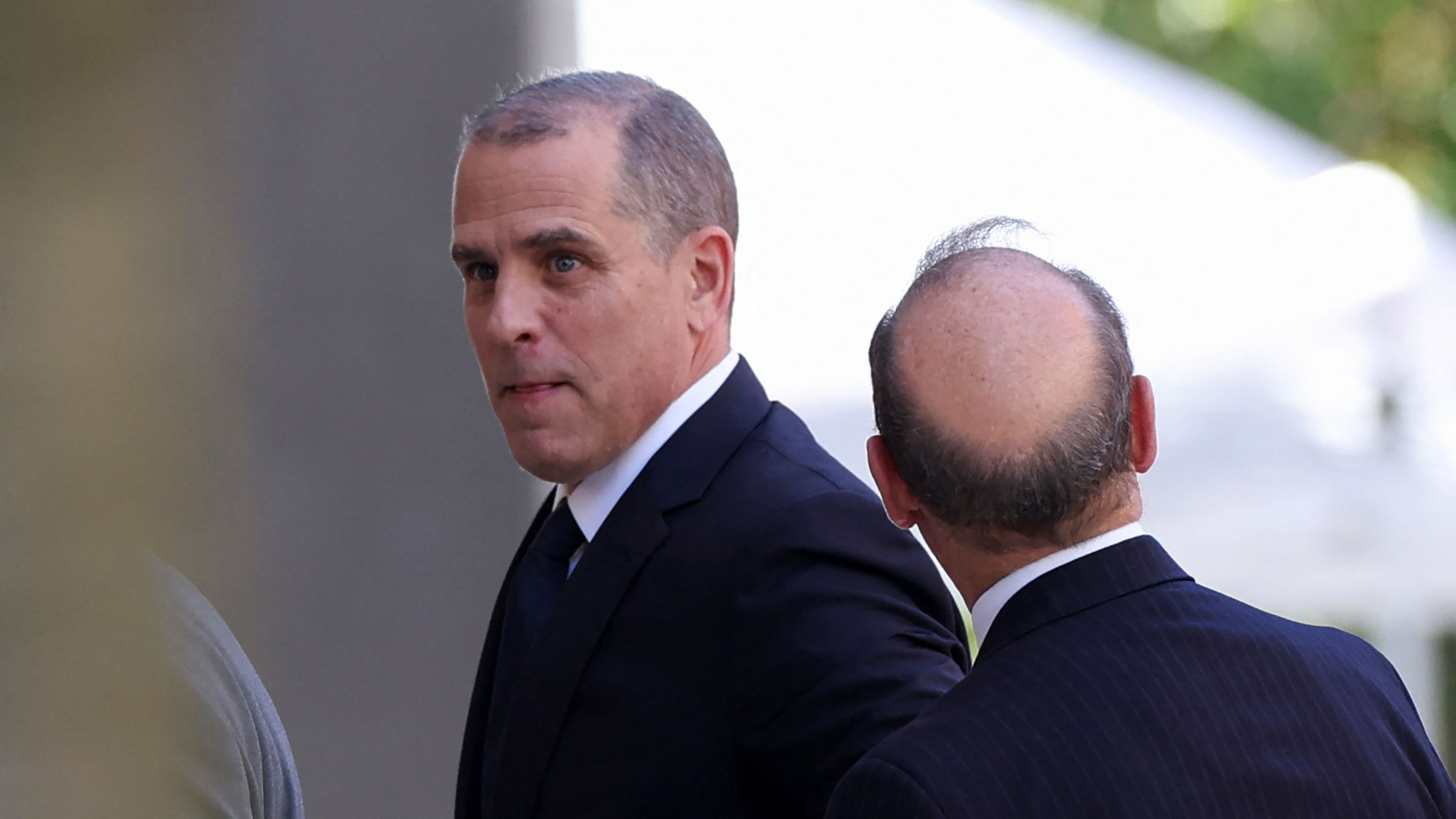President Joe Biden's son, Hunter Biden, walks to appear in a federal court on gun charges in Wilmington, Delaware, on Tuesday.