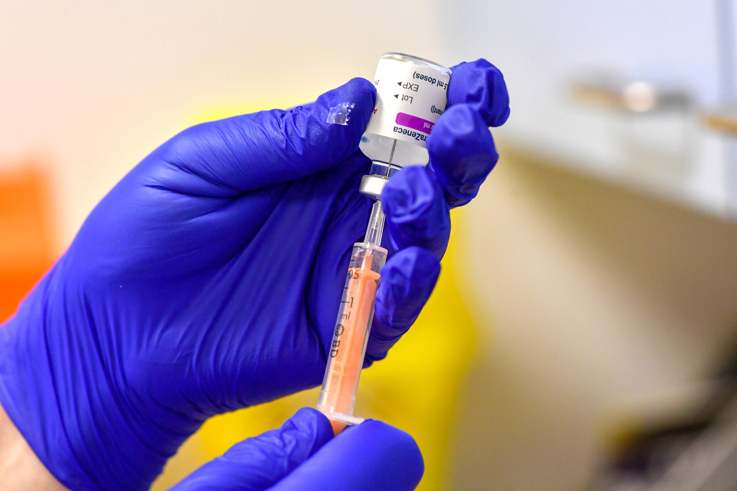 A nurse prepares a dose of the Oxford-AstraZeneca coronavirus vaccine in Oldham, England, on January 21.