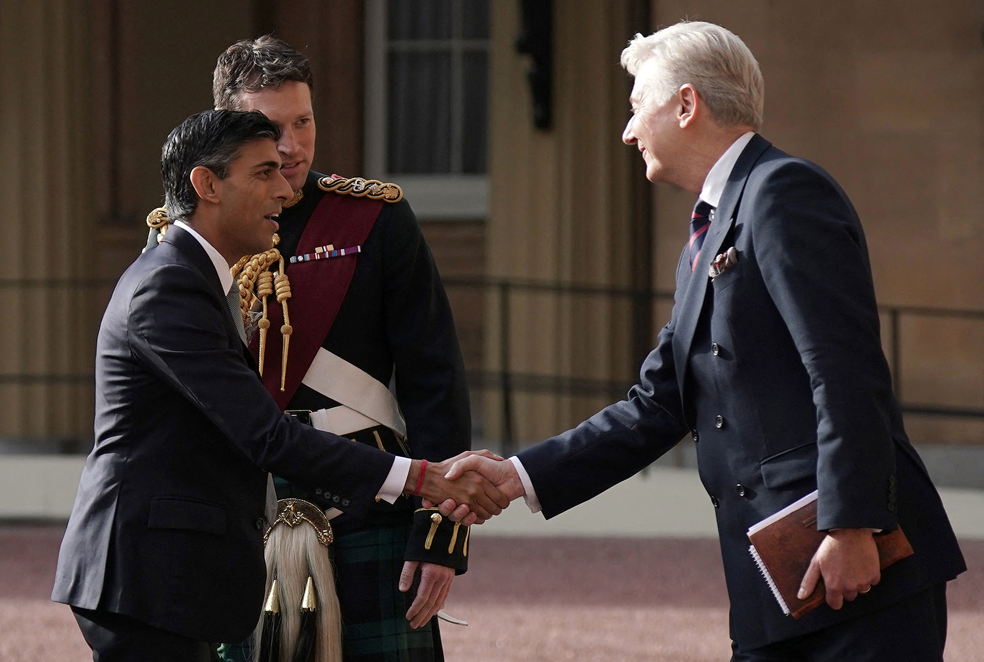 New Conservative Party leader and incoming prime minister Rishi Sunak arrives at Buckingham Palace in London on Tuesday for his audience with the King.