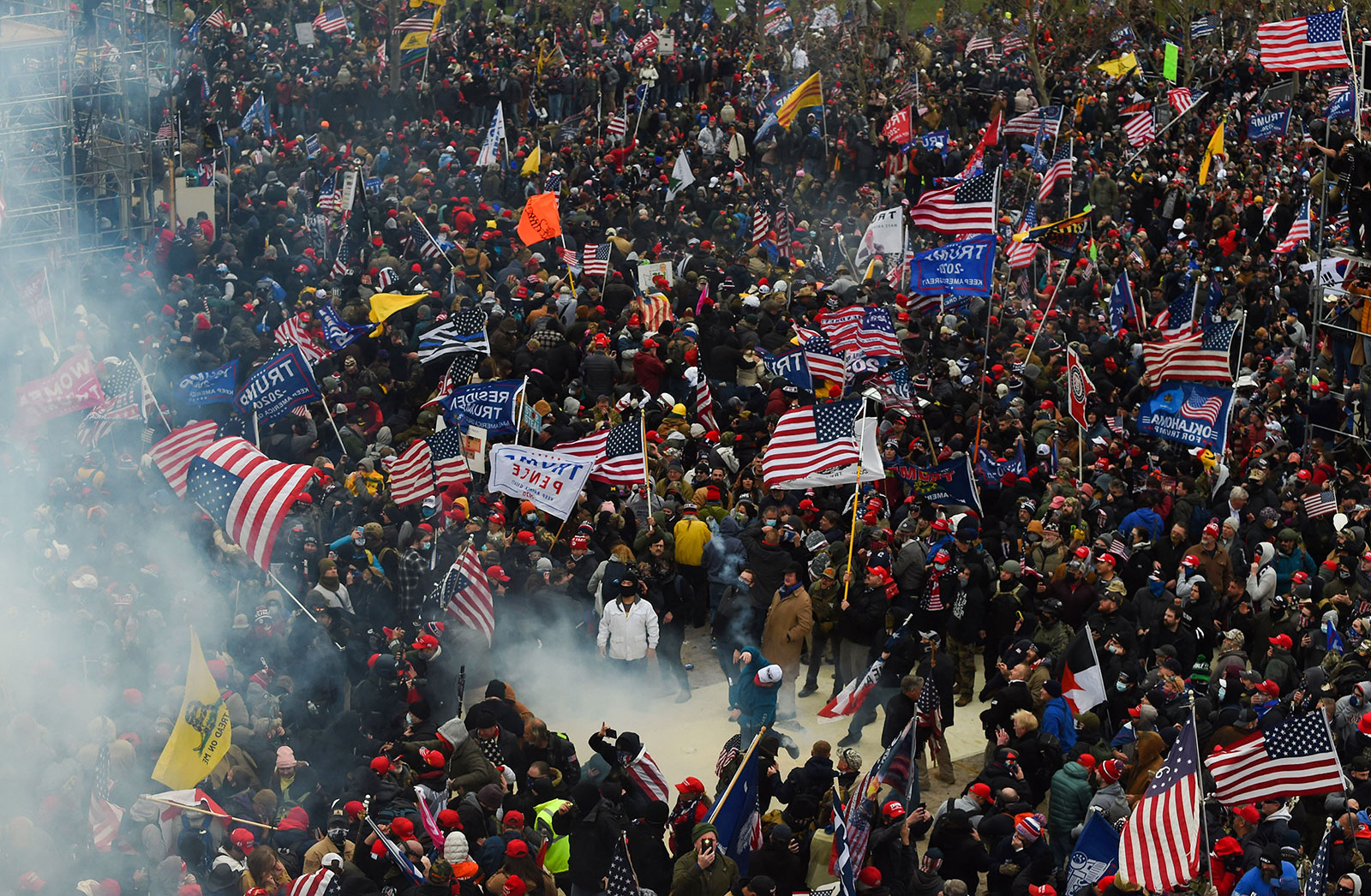 Trump supporters clash with police and security forces as they storm the Capitol in Washington, DC, on January 6, 2021.