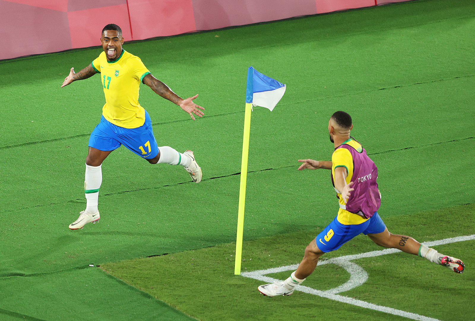 Malcom of Team Brazil celebrates after scoring Brazil's second goal during the men's gold medal match between Brazil and Spain on day fifteen of the Tokyo 2020 Olympic Games at International Stadium Yokohama on August 7, in Yokohama, Japan. 