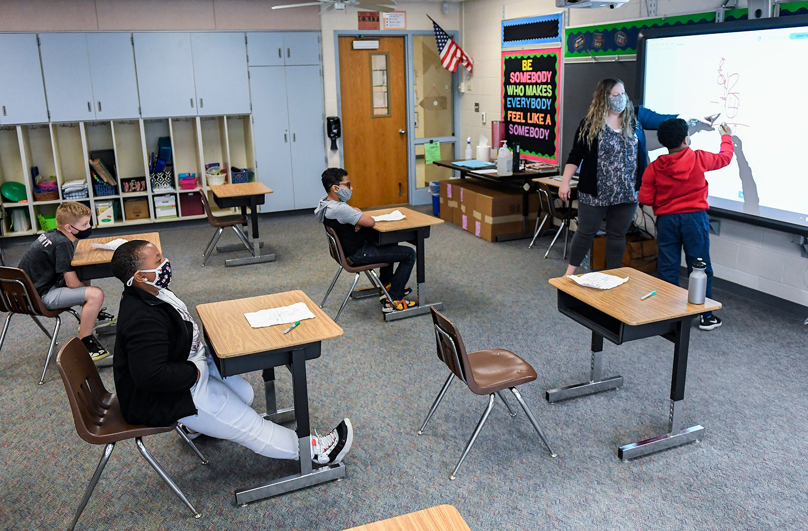 Sabrina Werley works with her students during a math class in Cumru Township, Pennsylvania, on April 14.