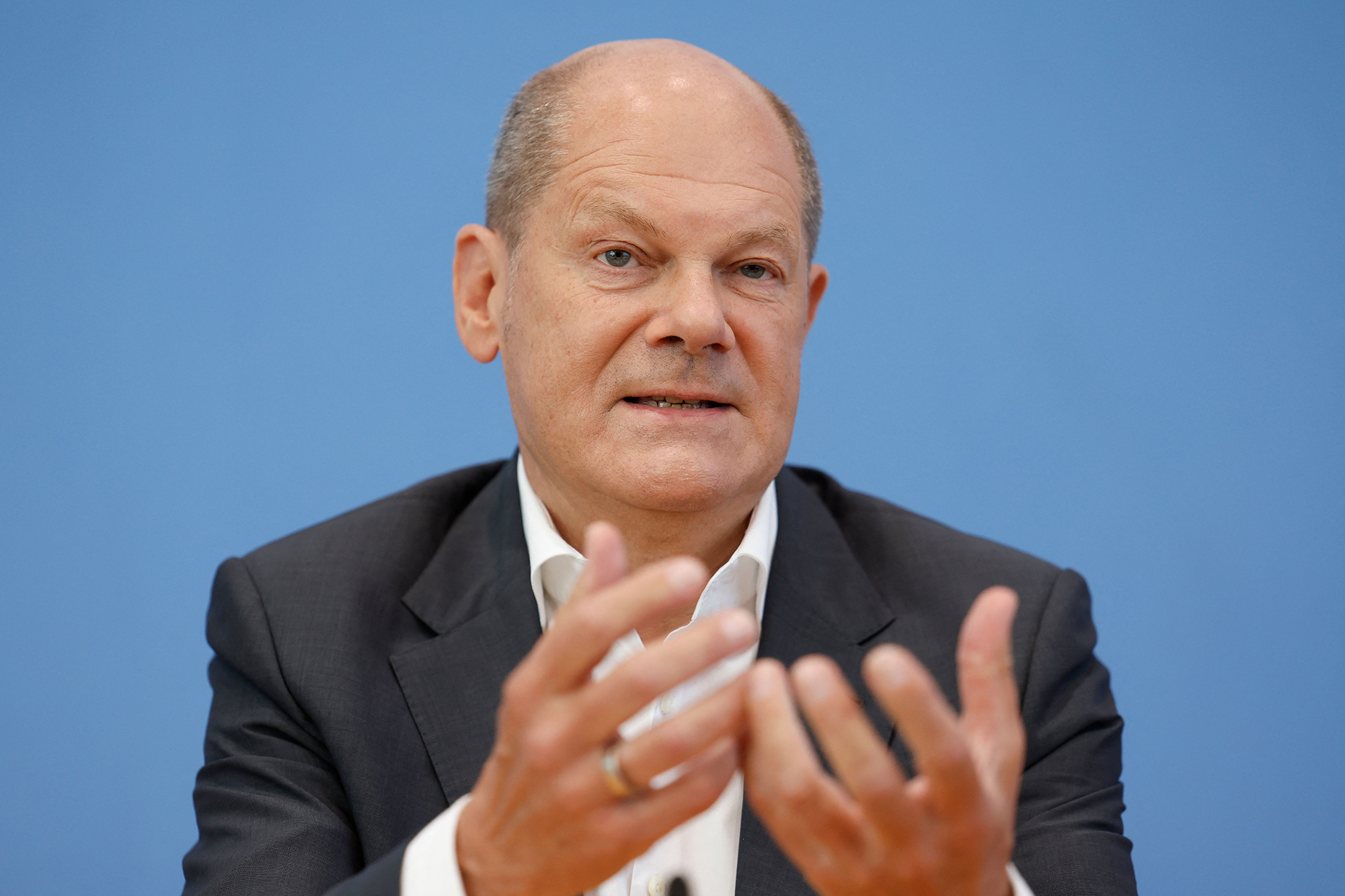 German Chancellor Olaf Scholz speaks during a press conference in Berlin on August 11. 