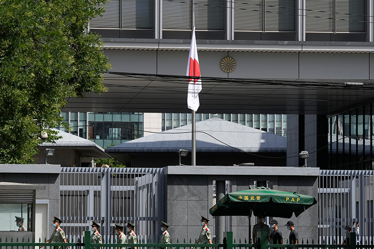 The Japanese flag is flown at half staff at the Japanese Embassy in Beijing on July 9. 