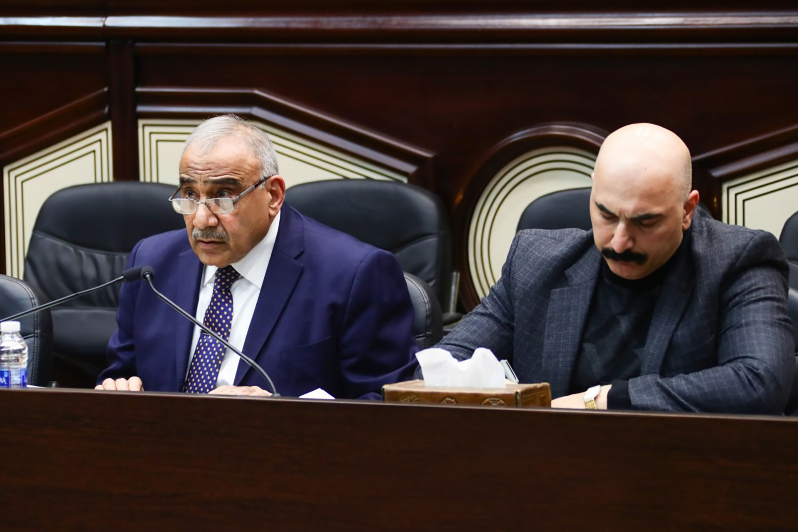 Iraqi Prime Minister Adil Abdul Mahdi (left) attends a parliament session in Baghdad, Iraq, on January 5.