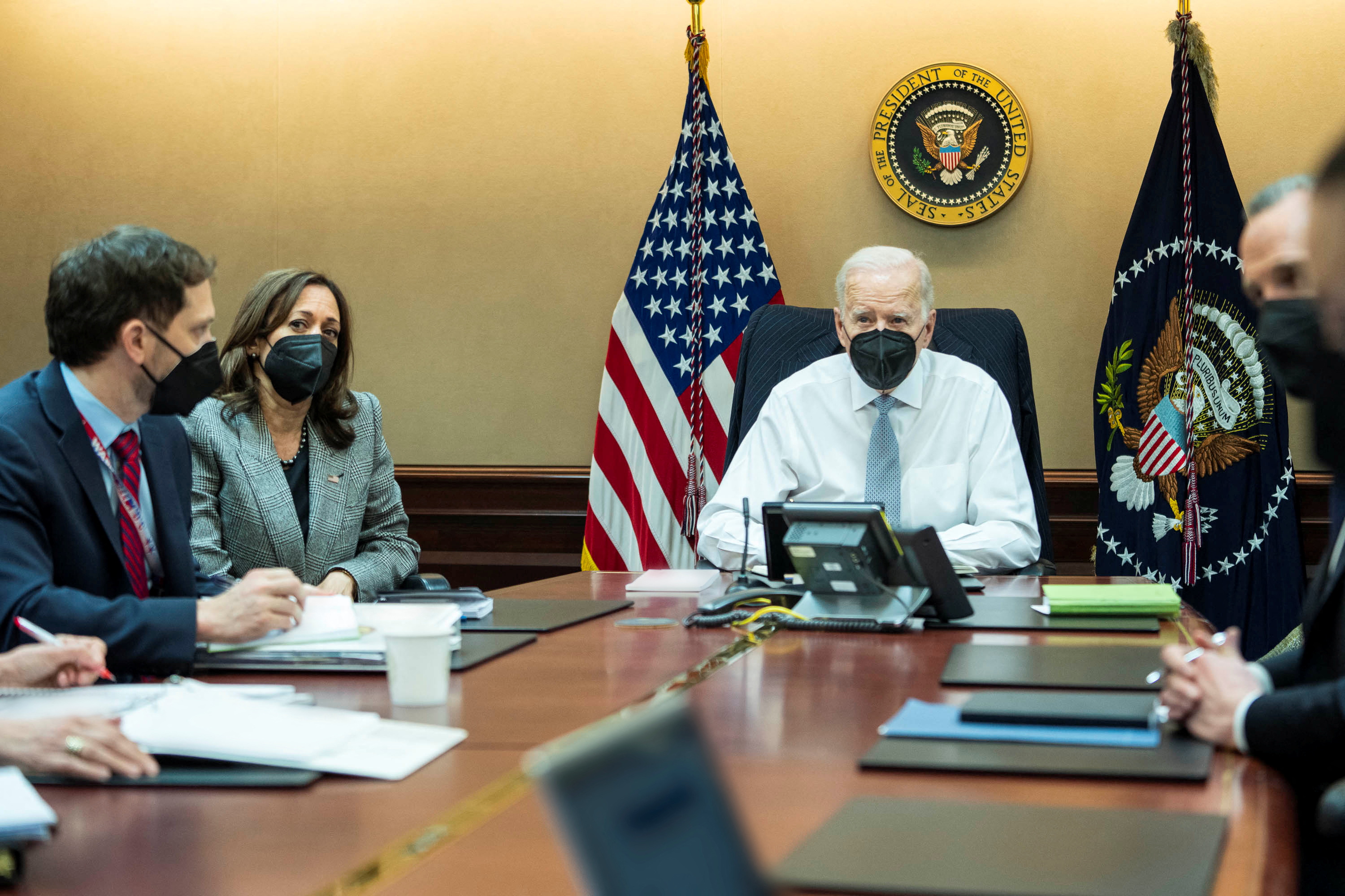 US President Joe Biden, Vice President Kamala Harris and other White House national security personnel are seen in a photo broadcast from the White House while viewing US Special Forces operations in Northern Syria against ISIS leader Abu Ibrahim al-Hashemi al-Quraishi from the Situation Room at the White House in Washington, US February 3.