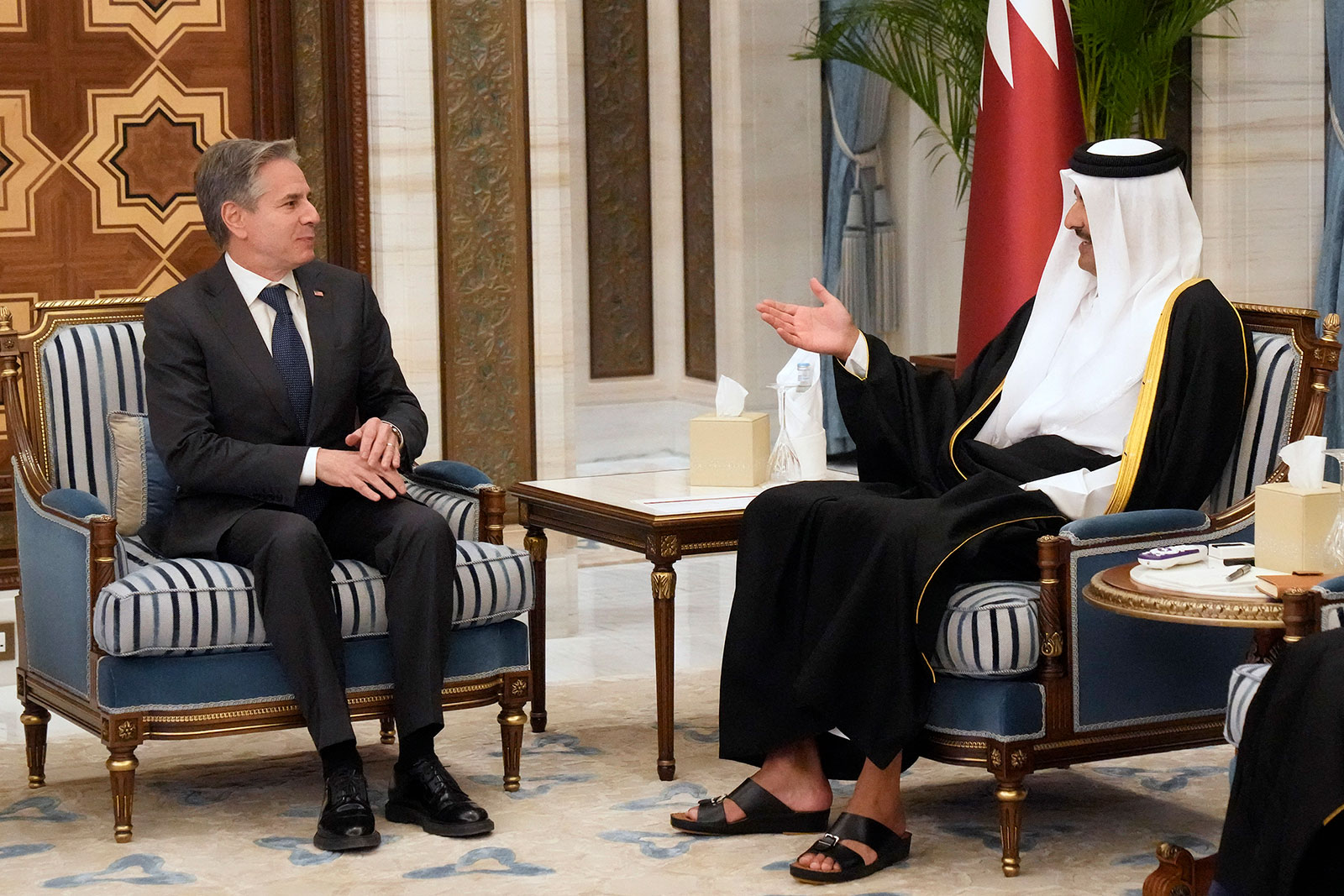 Secretary of State Antony Blinken, left, meets with Qatari Emir Sheikh Tamim bin Hamad Al Thani at Lusail Palace in Doha on Tuesday.