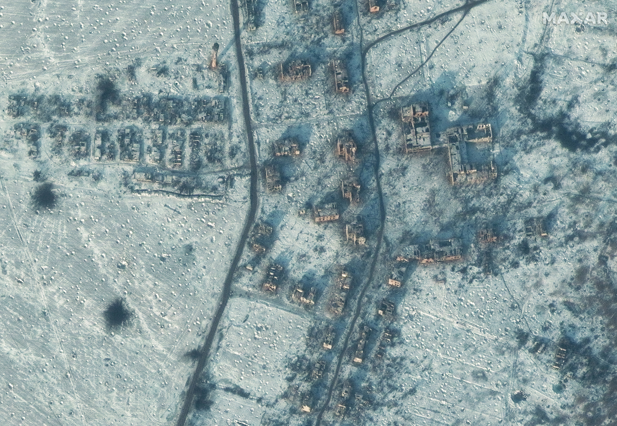 A satellite view shows a destroyed school and buildings in south Soledar, Ukraine, on January 10, 2023.