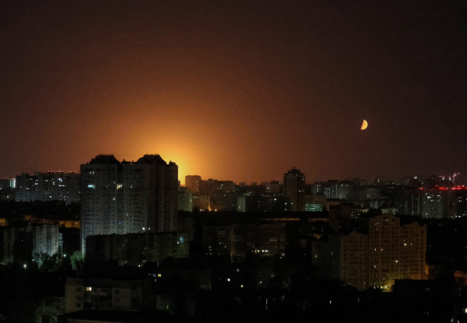An explosion of a drone is seen in the sky over the city during a Russian drone strike in Kyiv, Ukraine on May 28.