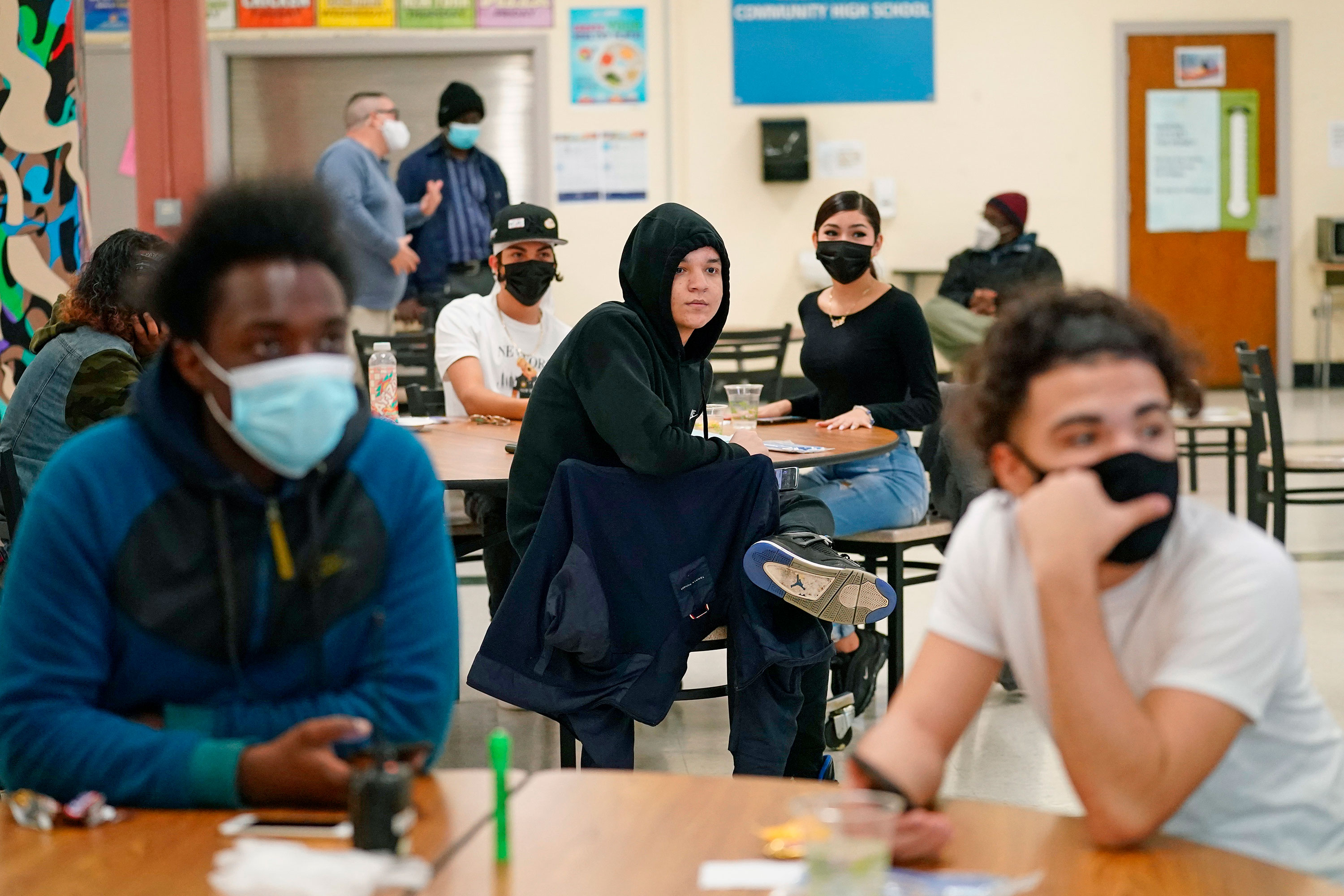 High school students listen to questions posed by their principal in Brooklyn, New York, on October 29.