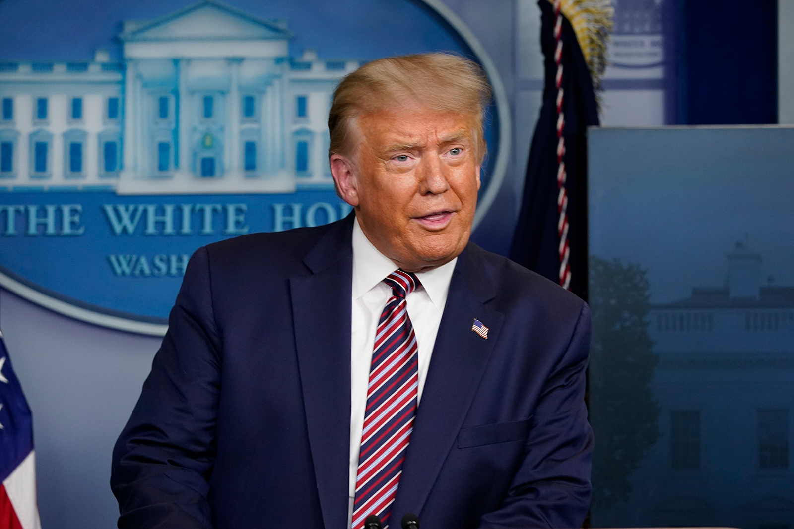 President Donald Trump speaks at a news conference in the James Brady Press Briefing Room at the White House, Wednesday, Aug. 12 in Washington.