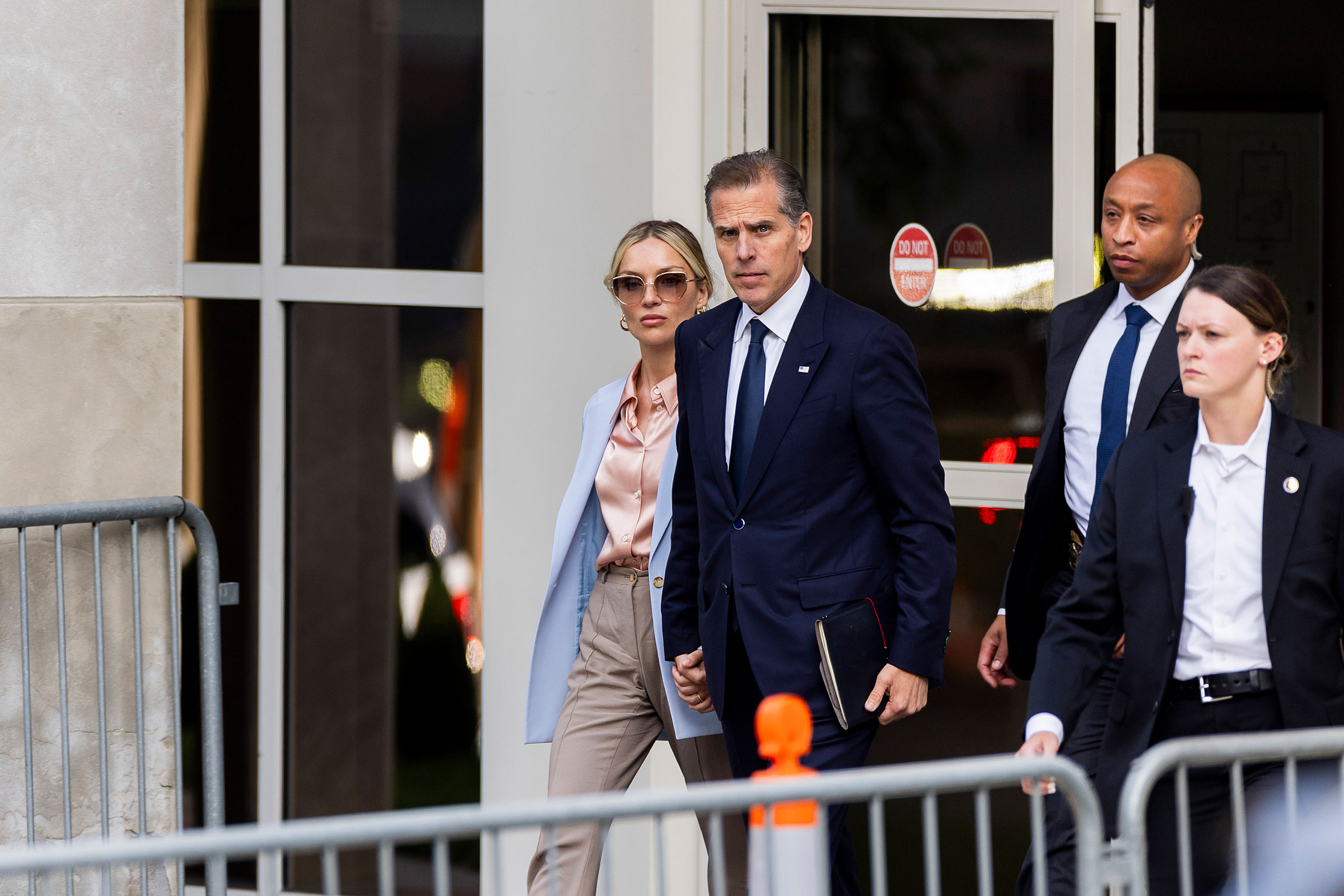 Hunter Biden and his his wife Melissa Cohen Biden depart from the J. Caleb Boggs Federal Building on June 4, in Wilmington, Delaware.