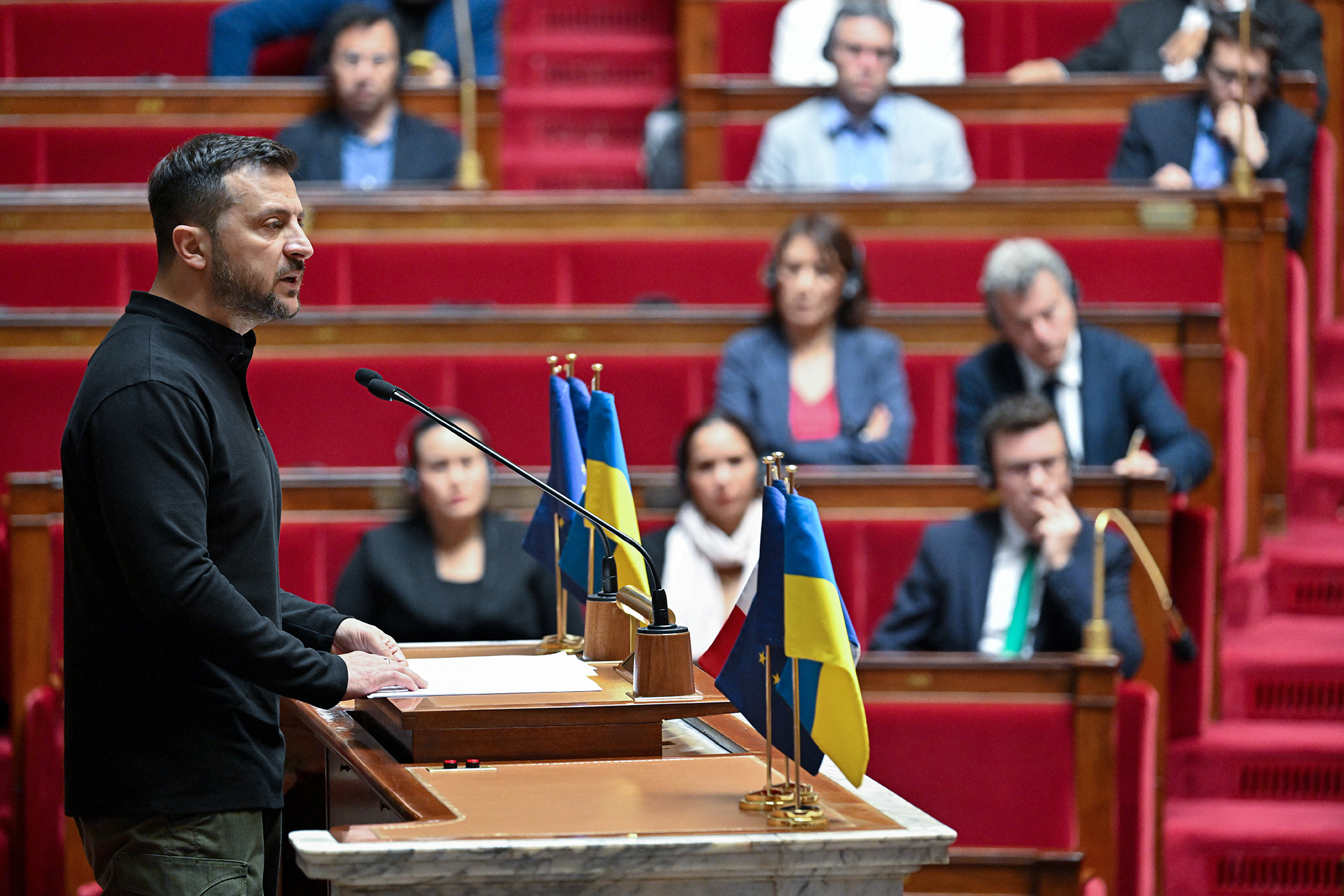 Ukrainian President Volodymyr Zelensky gives a speech on the stand at the French National Assembly in Paris, France on June 7.