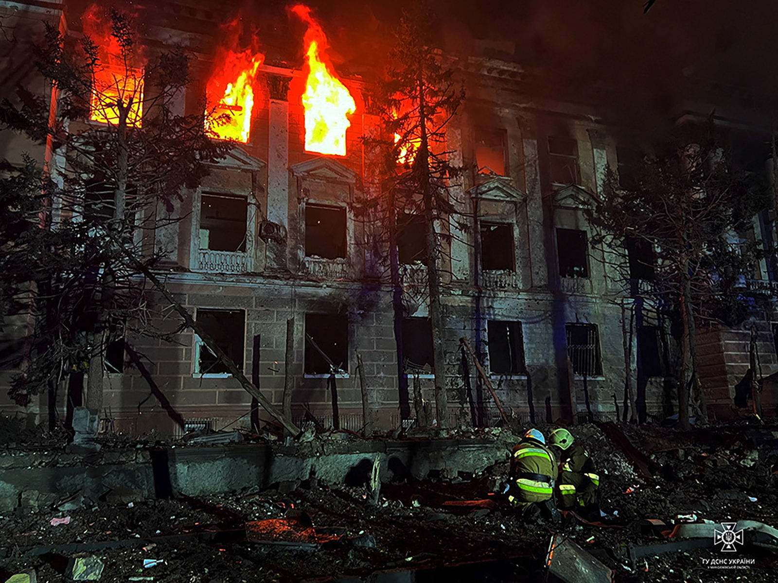 Firefighters work at a site of a building damaged by a Russian missile strike in Mykolaiv, Ukraine April 27.