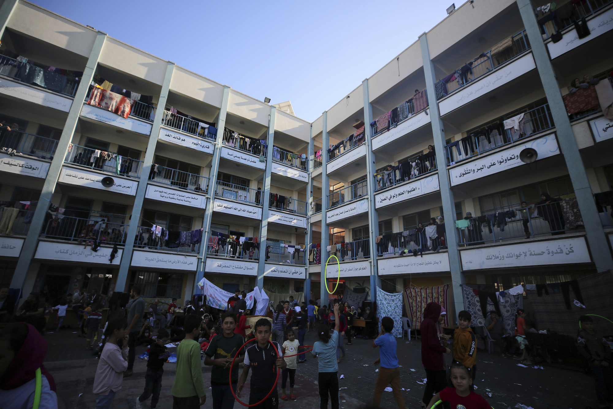 Internally displaced Palestinians take refuge at a United Nations school, in Deir al-Balah, Gaza, on Sunday.