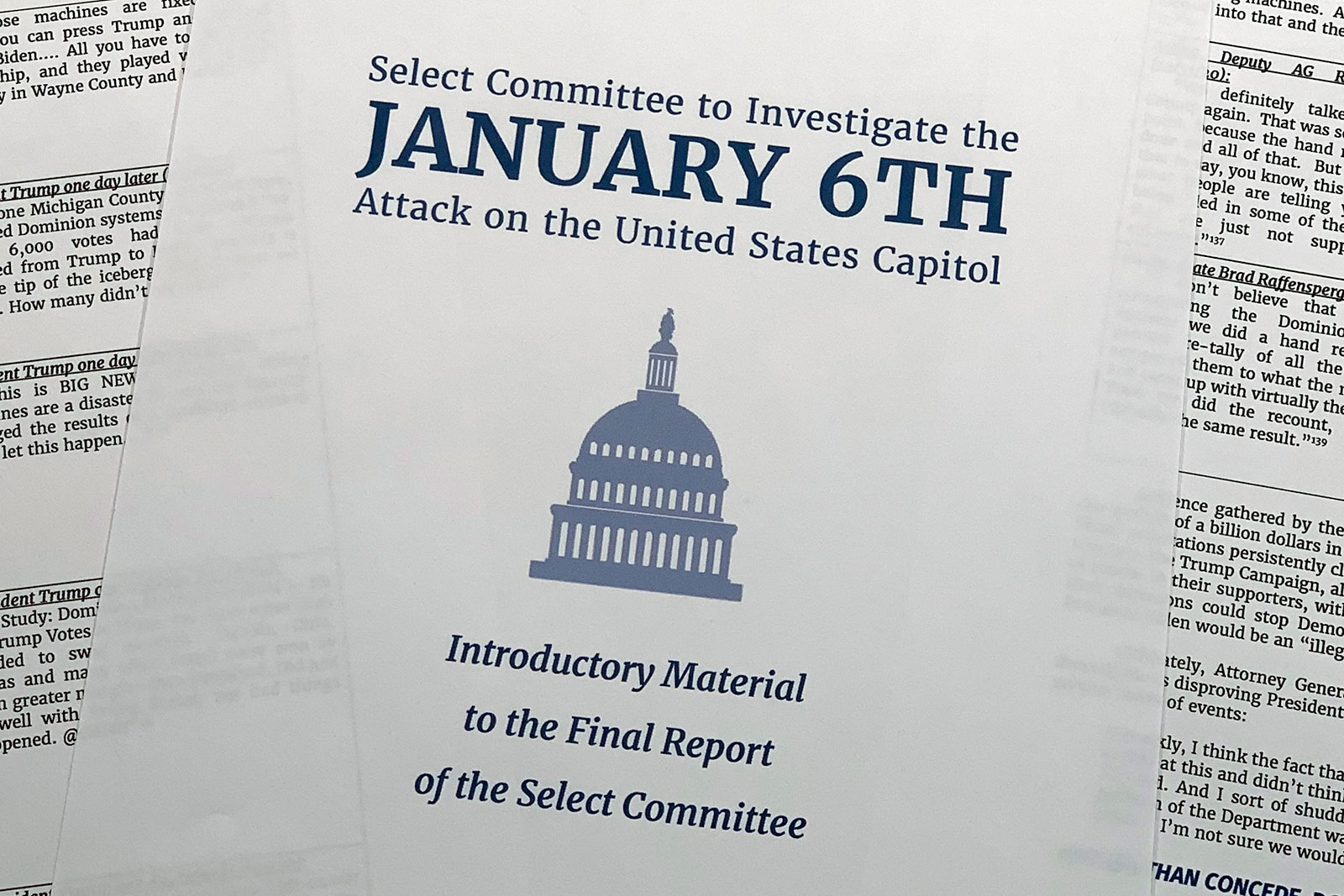 Pages of the executive summary from the House select committee investigating the Jan. 6, 2021 insurrection is seen on Monday. The committee is slated to release its full final report today. 