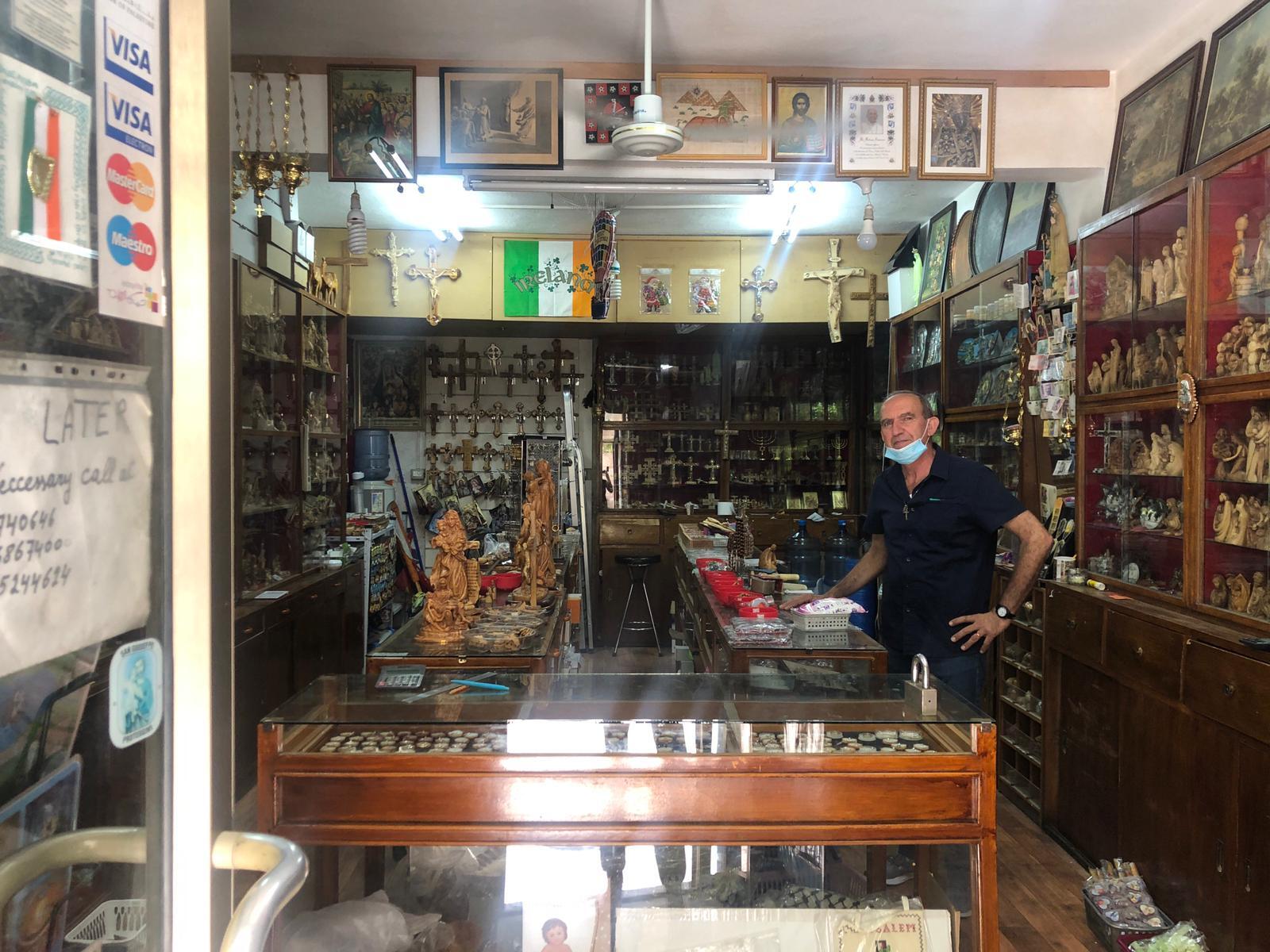 Louis Michel pictured in his tourist shop.