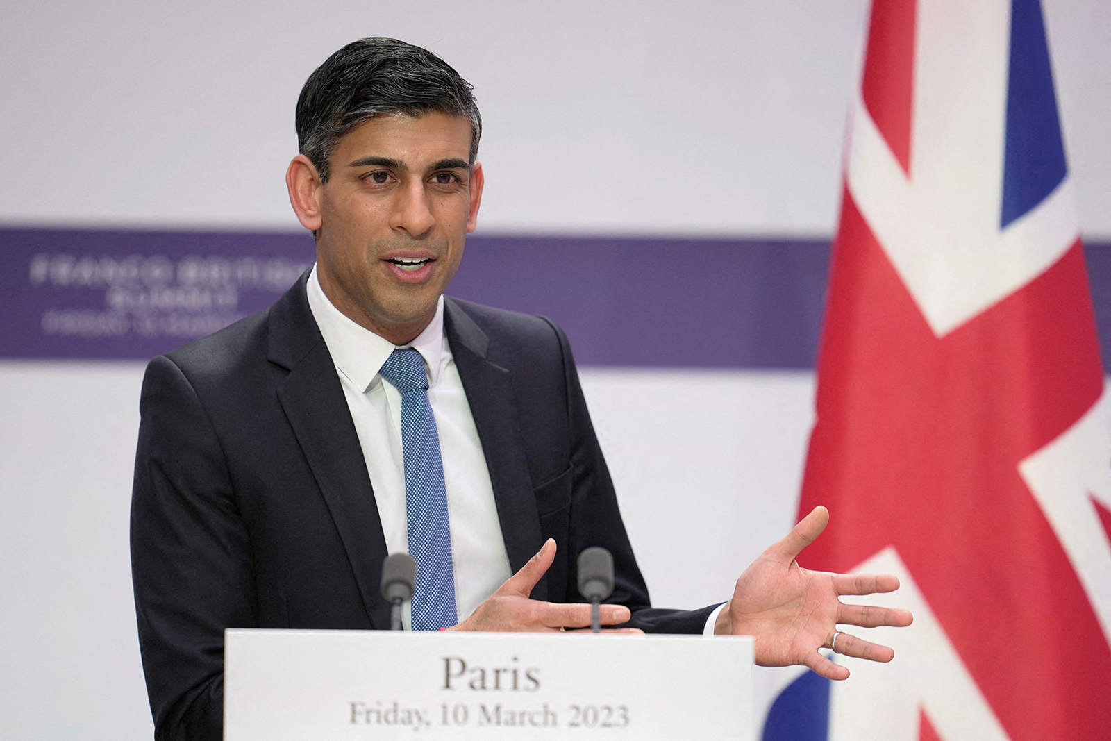 Rishi Sunak speaks during a news conference in Paris, France, on March 10.
