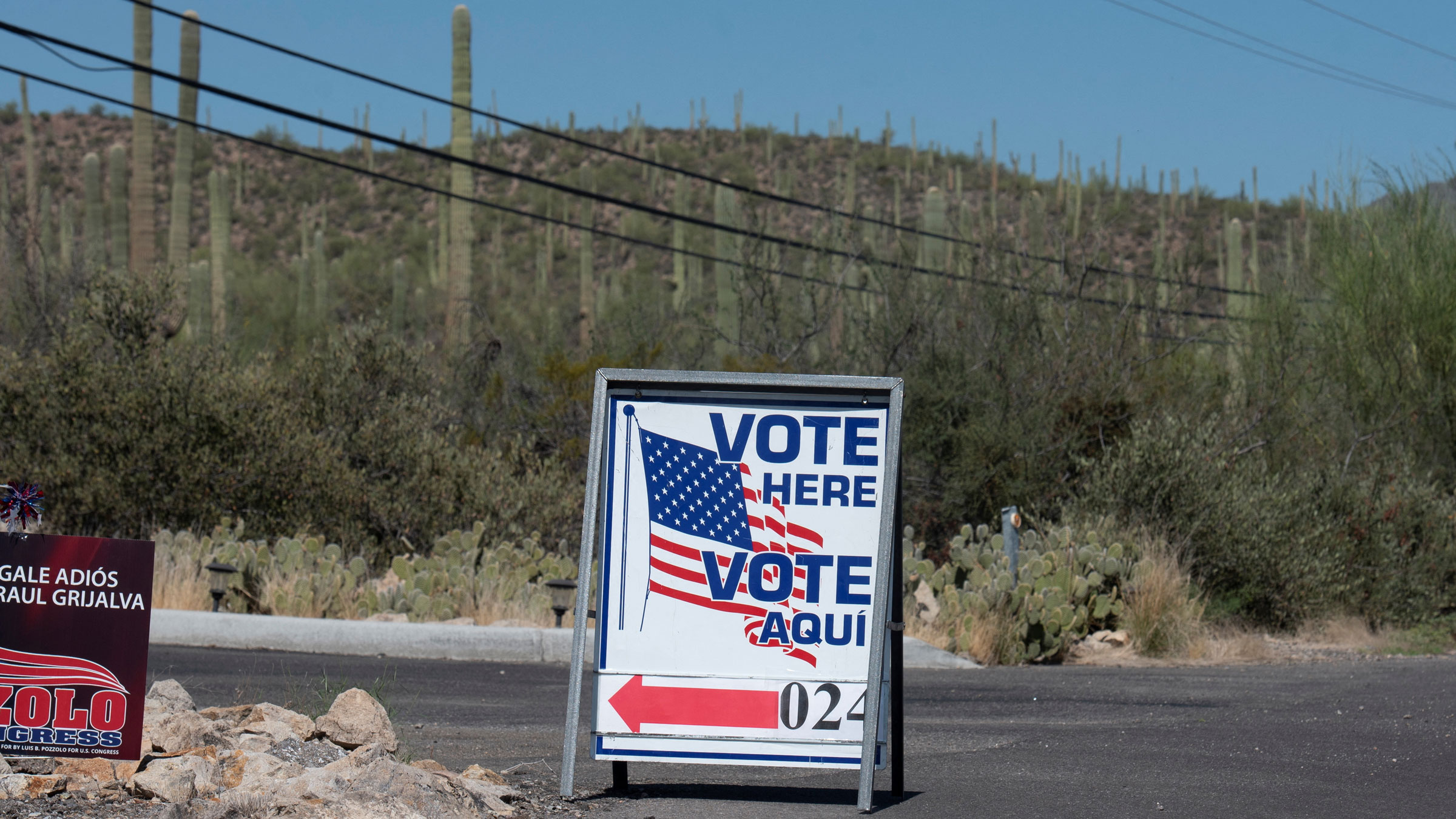 A sign guides voters to a polling station in Tucson, Arizona, on Tuesday.