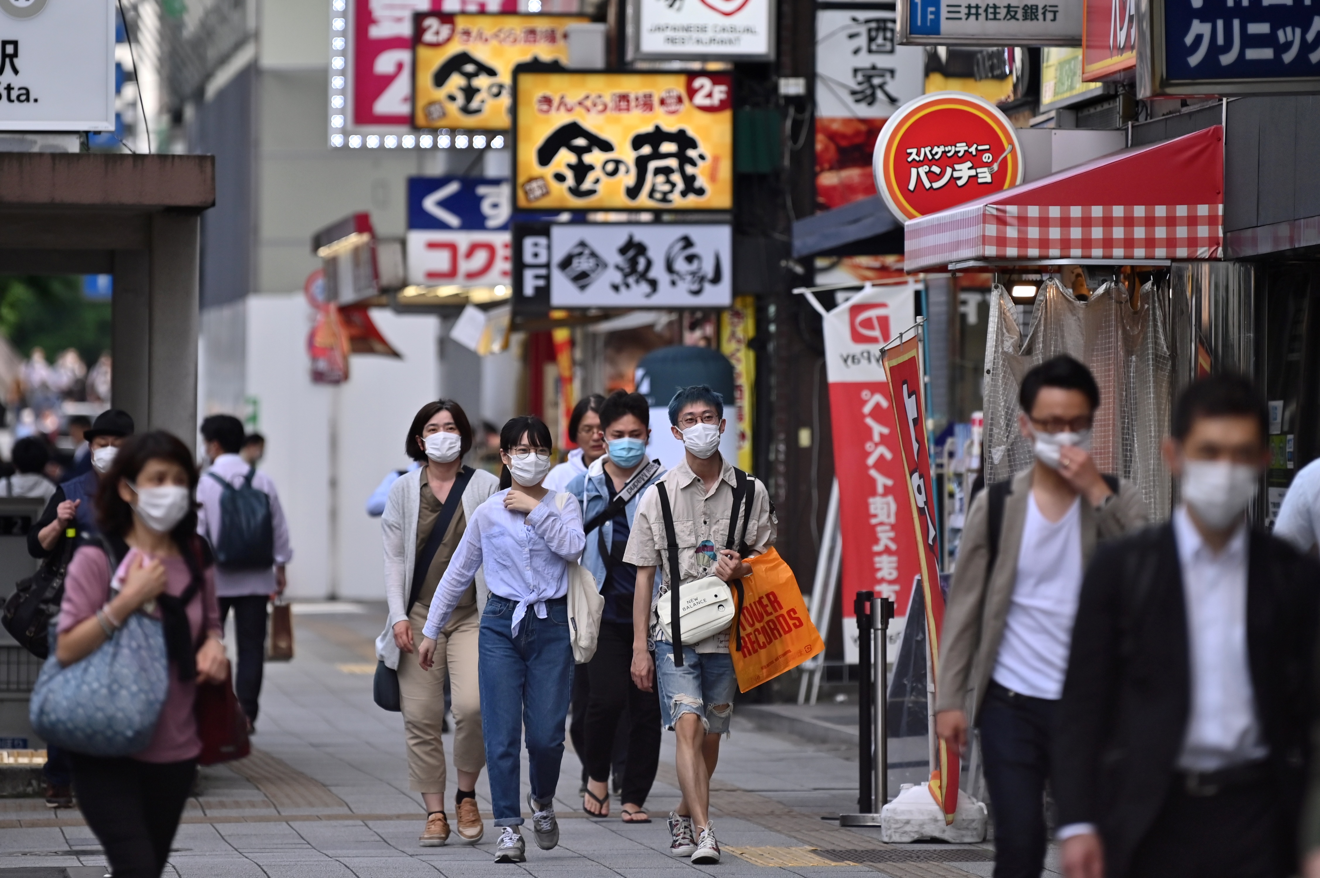 People walk in Tokyo's Akihabara area on May 27.