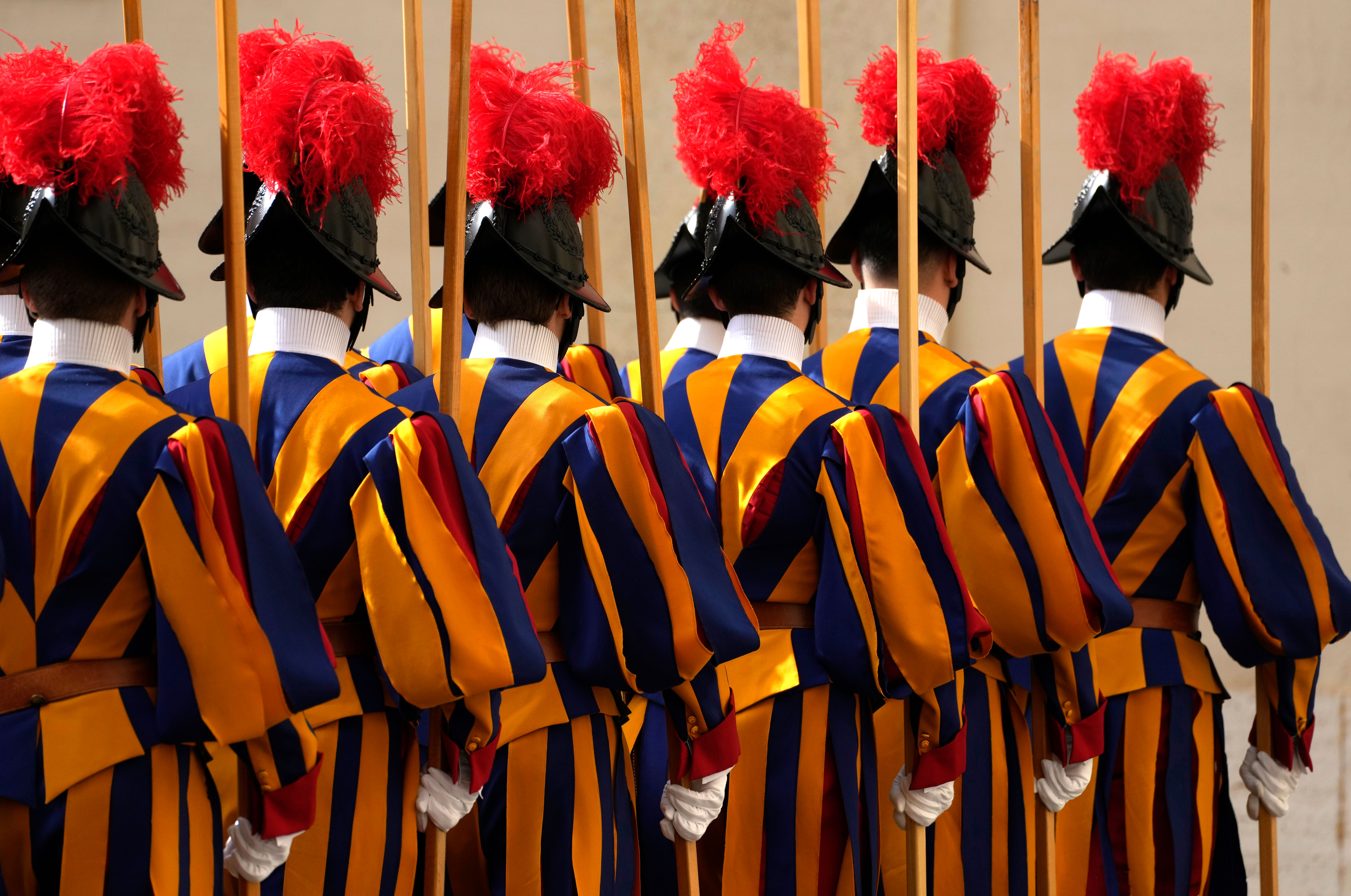The Swiss Guards prepare for the arrival of President Joe Biden for a meeting with Pope Francis at the Vatican on October 29.