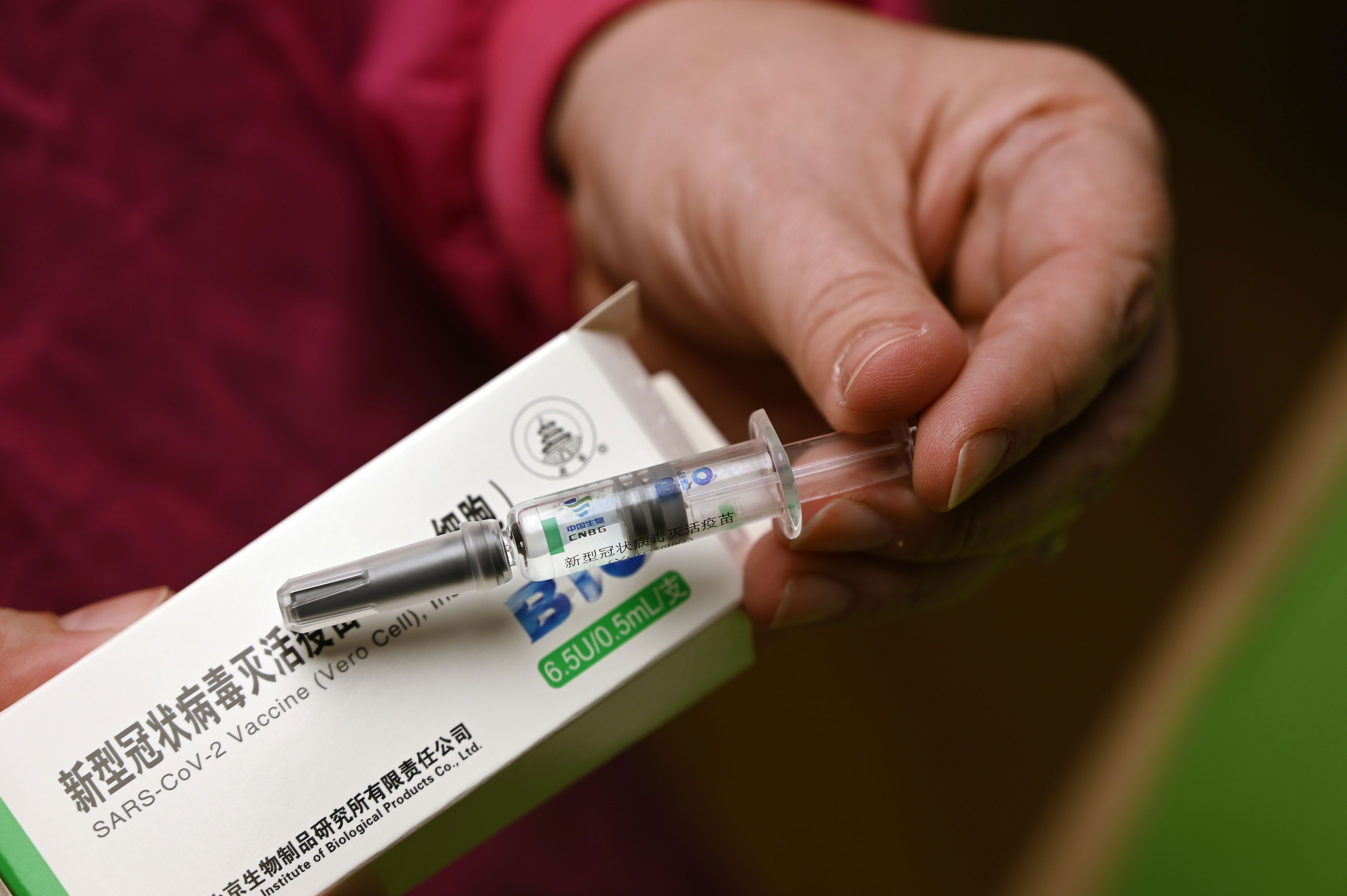 A nurse in Budapest, Hungary, holds a dose of the Covid-19 vaccine developed by China's Sinopharm on February 25.